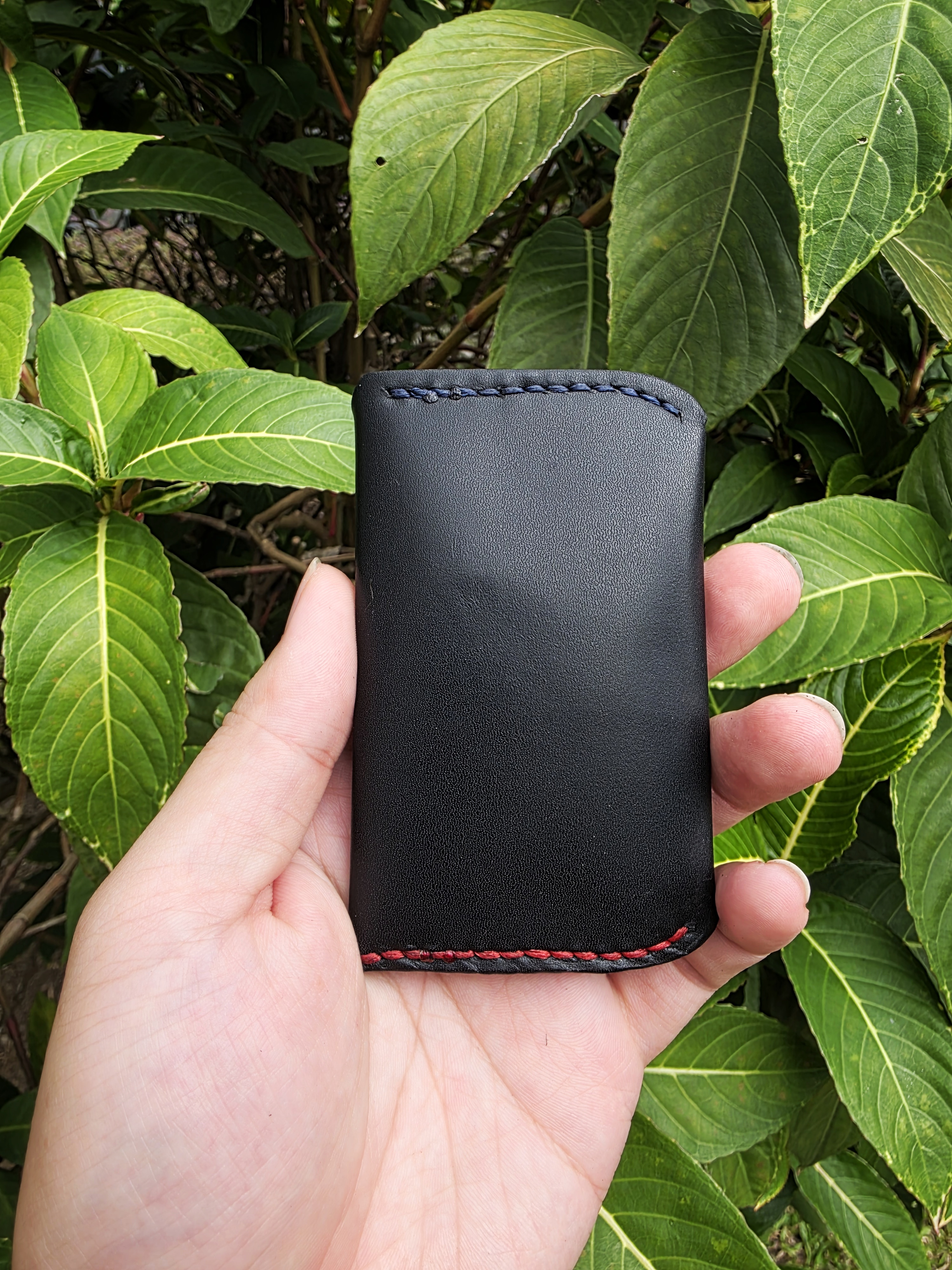 The Namibia: A simple button card sleeve in black leather
