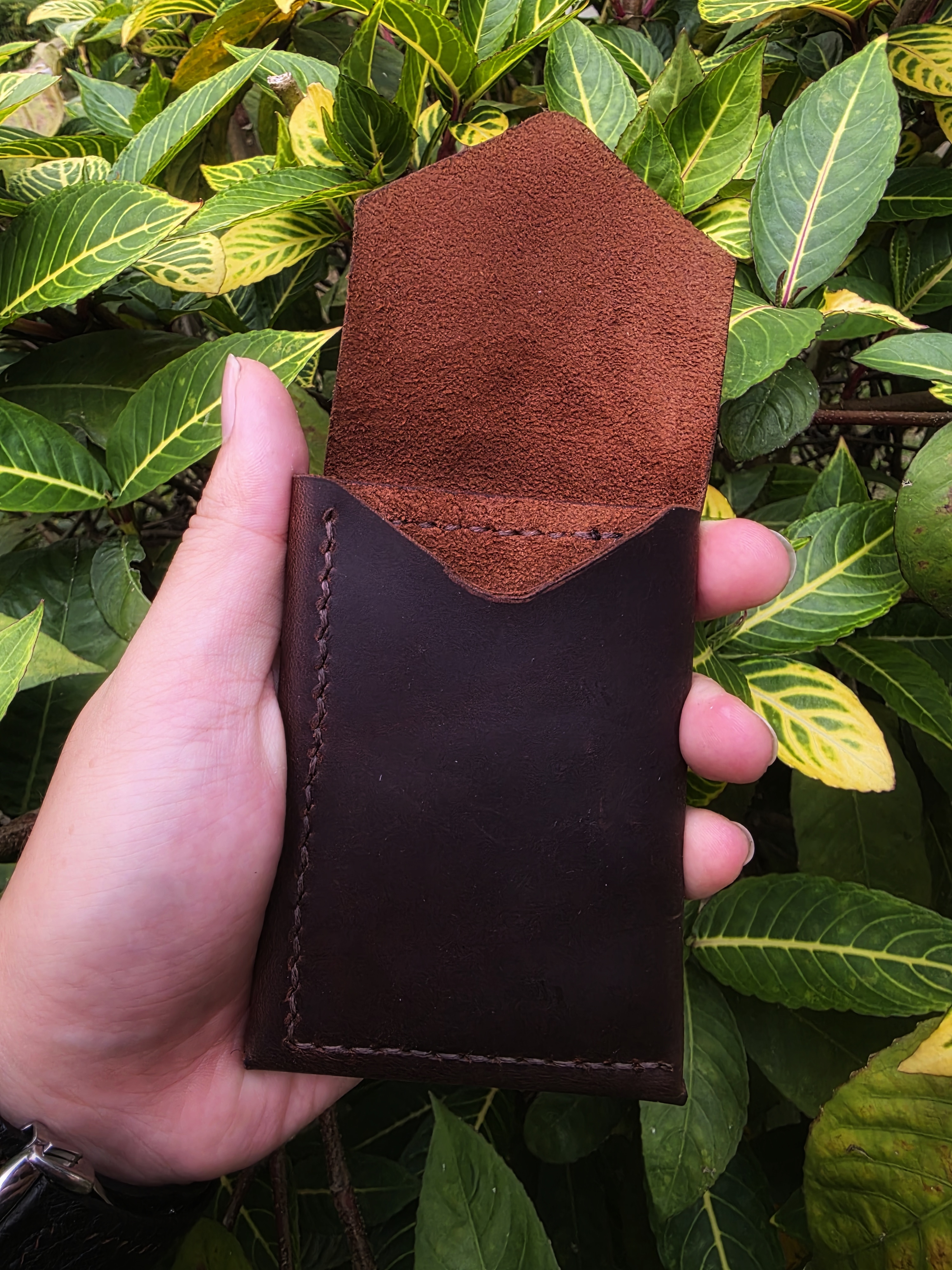 The Icaria: a cash flap wallet in brown pull up leather inspired by Oldis Road's wallet