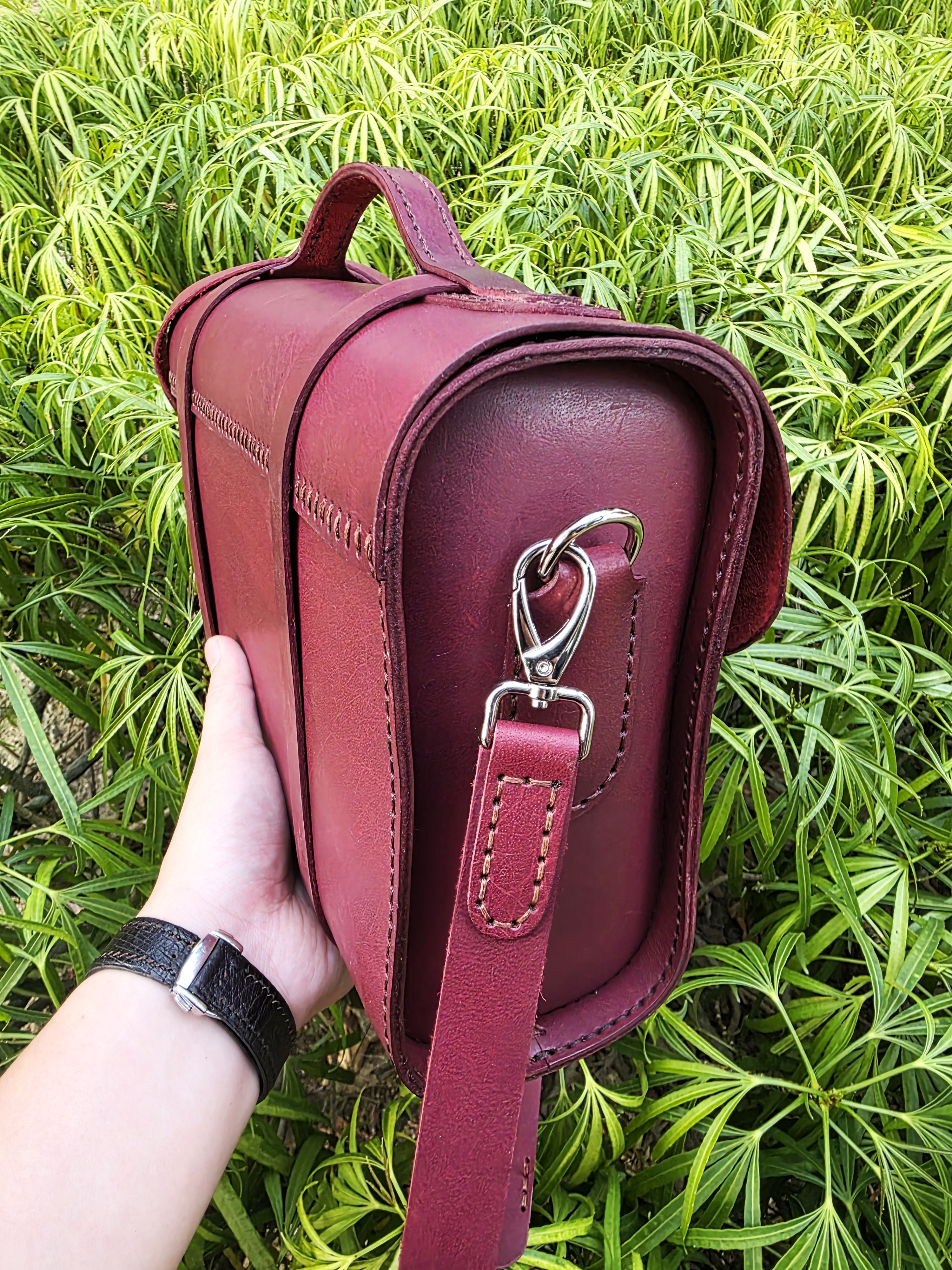 The Andes: A leather messenger sling bag