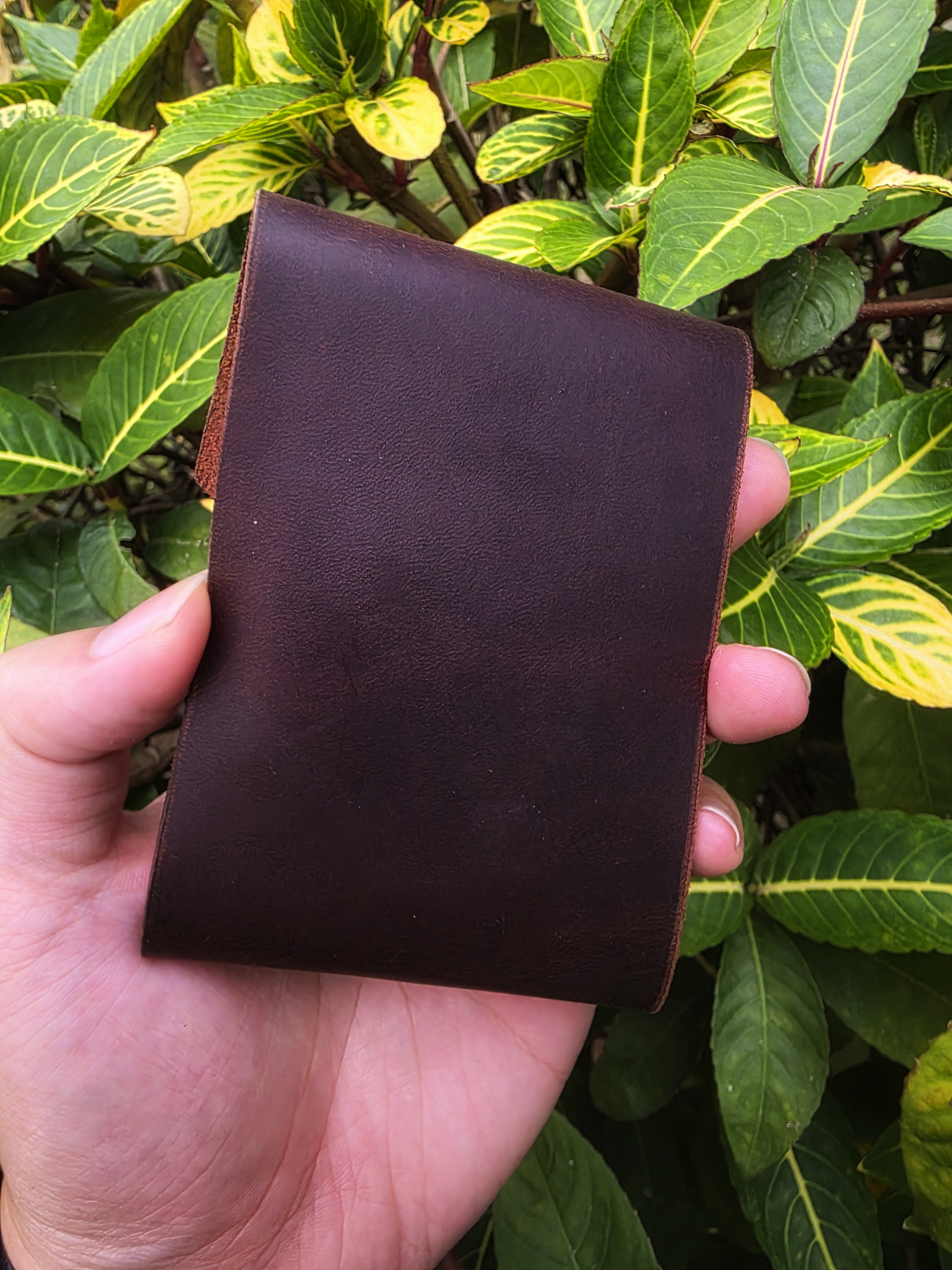 The Icaria: a cash flap wallet in brown pull up leather inspired by Oldis Road's wallet
