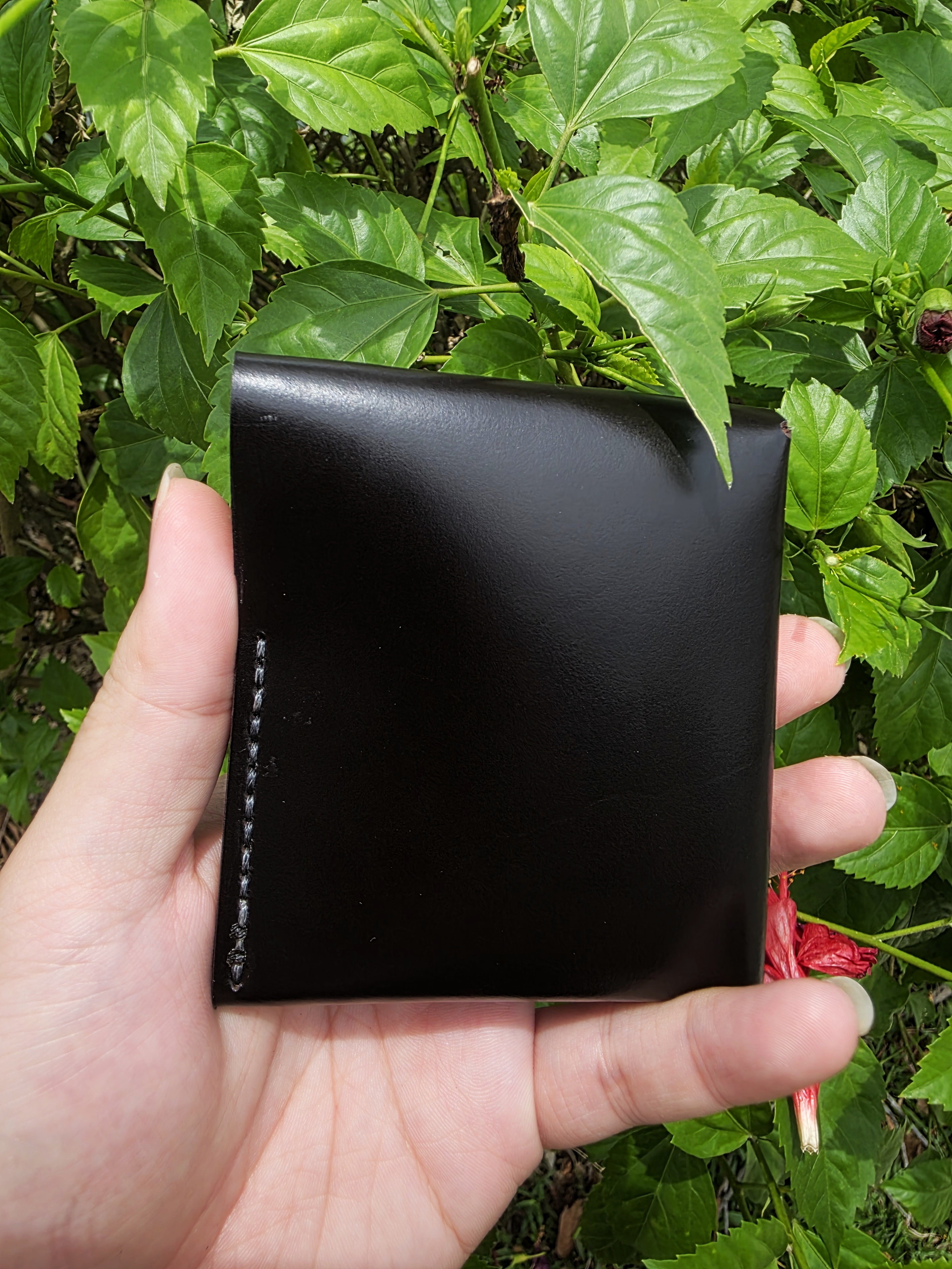 The Oahu Card version in glossy dark brown leather