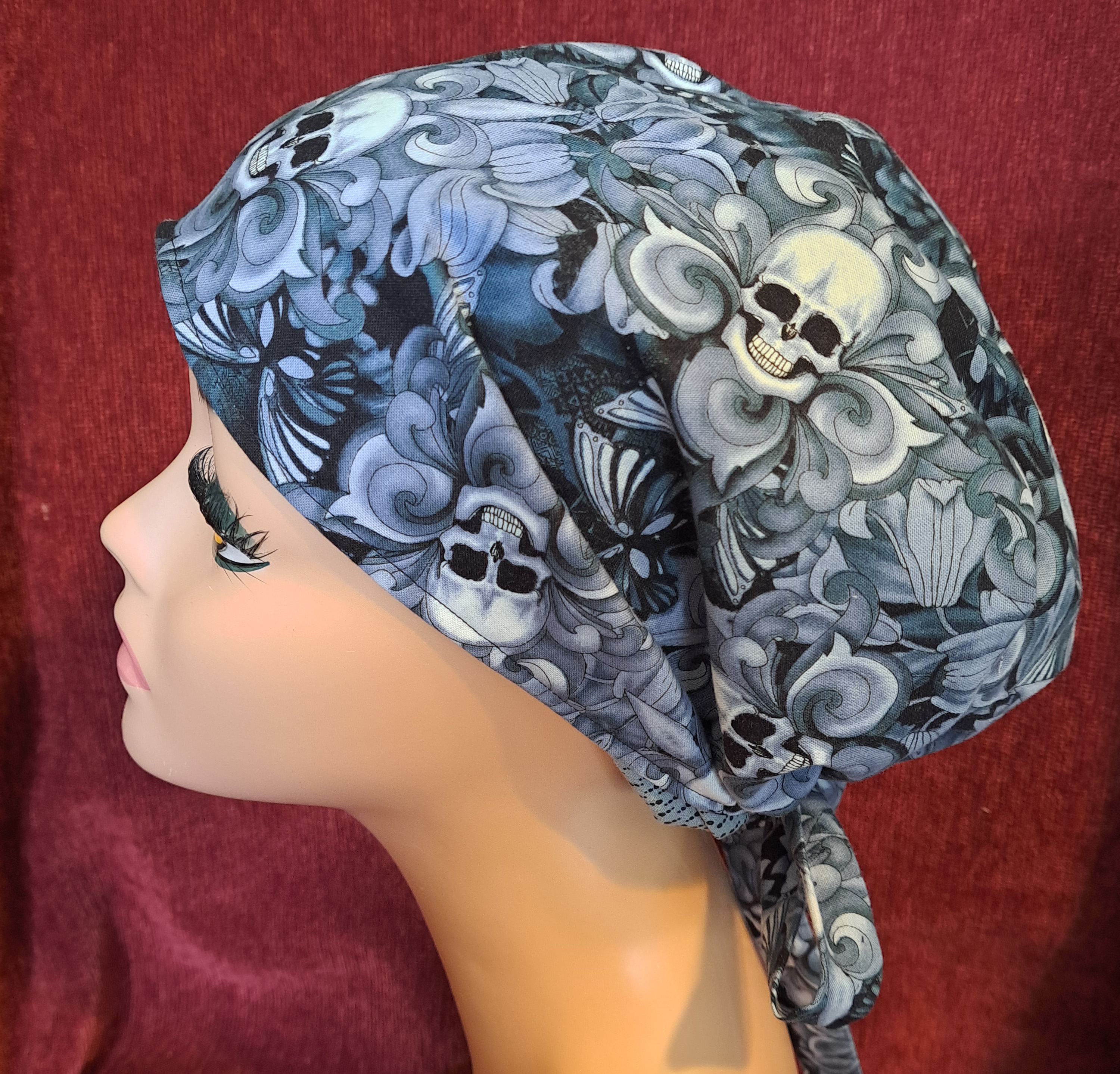Handmade Reversible Pony Tail Scrub Cap - Gray Skull Fabric Reverses to Gray and Black Dot Fabric