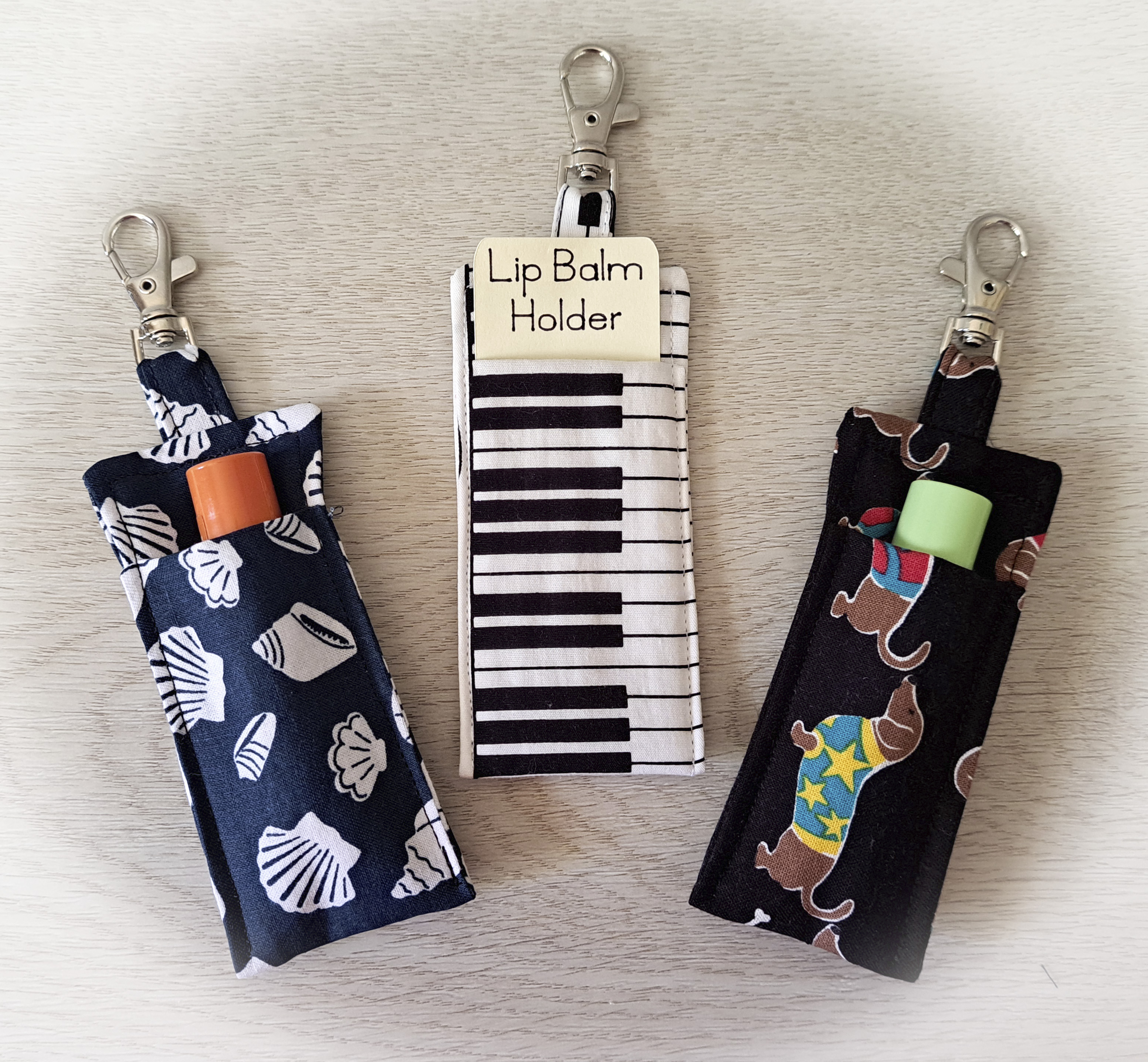 Handmade Fabric Lip Balm Holder with Rotating Clasp - Seashells, Piano Keys, Dogs - Single or Set of 3