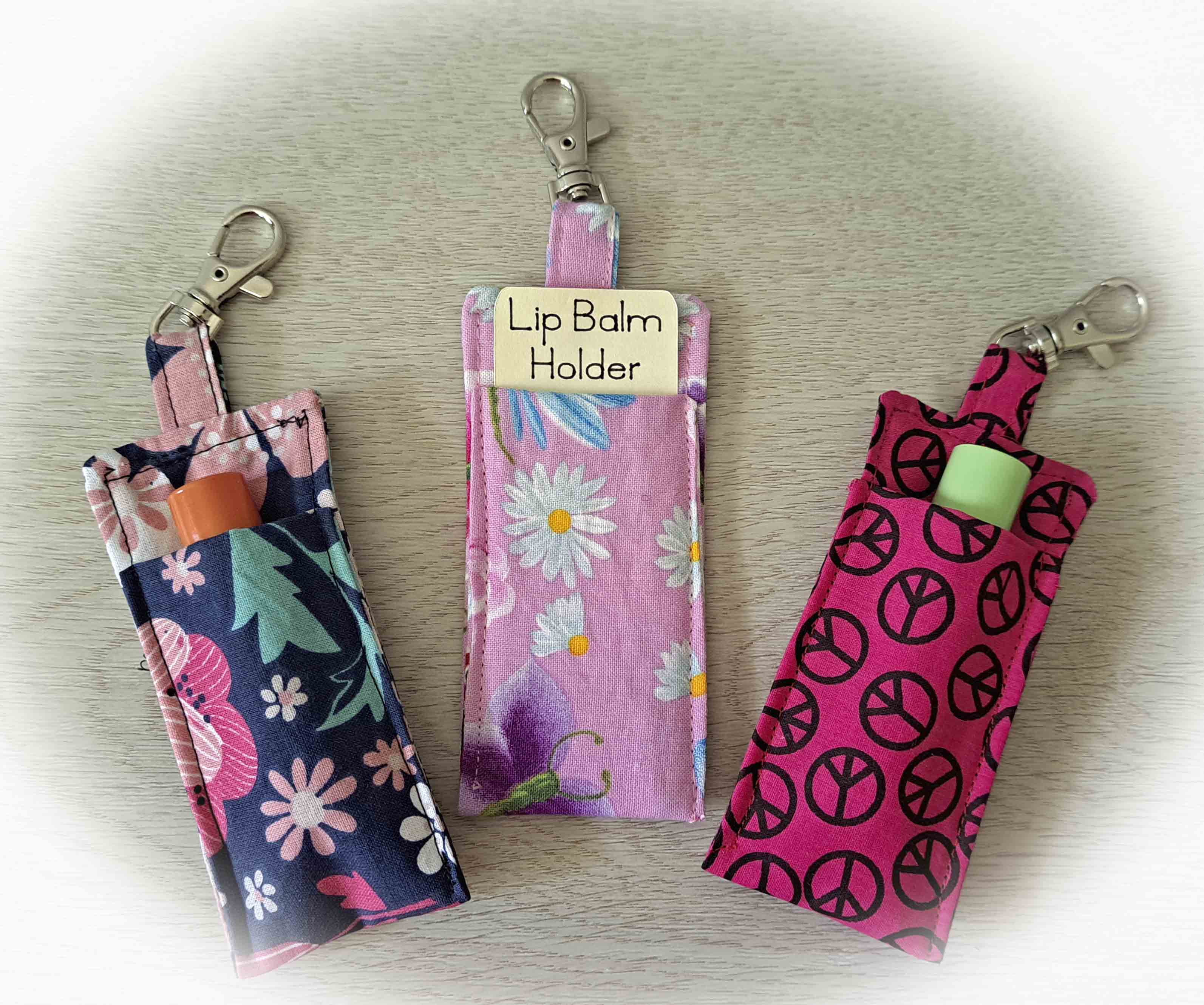 Handmade Fabric Lip Balm Holder with Rotating Clasp - Blue Flowers, Pink Flowers or Pink Peace Sign - Single or Set of 3