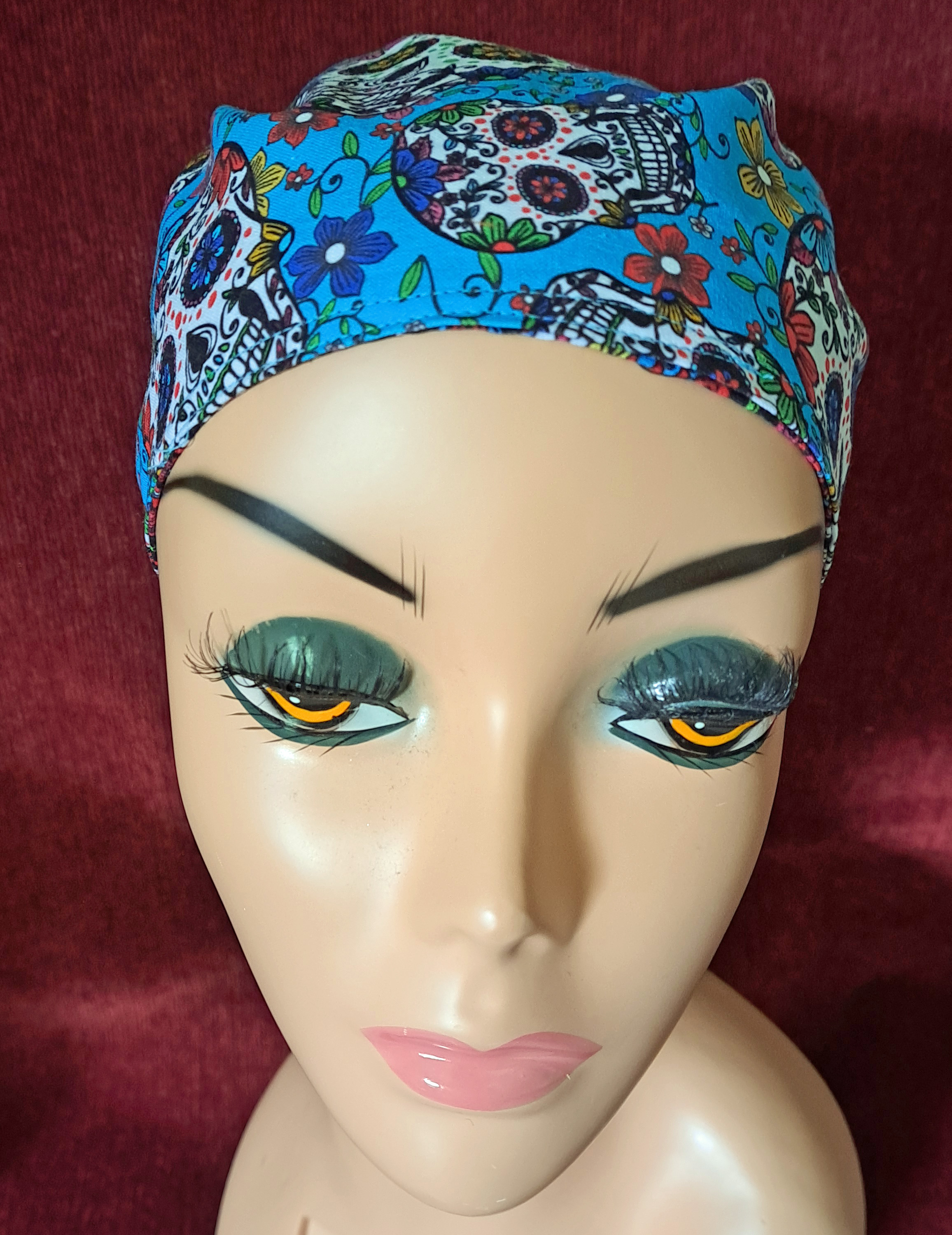 Handmade Sugar Skulls Reversible Pony Tail Scrub Cap - Turquoise Sugar Skull Fabric Reverses to Black Sugar Skull Fabric