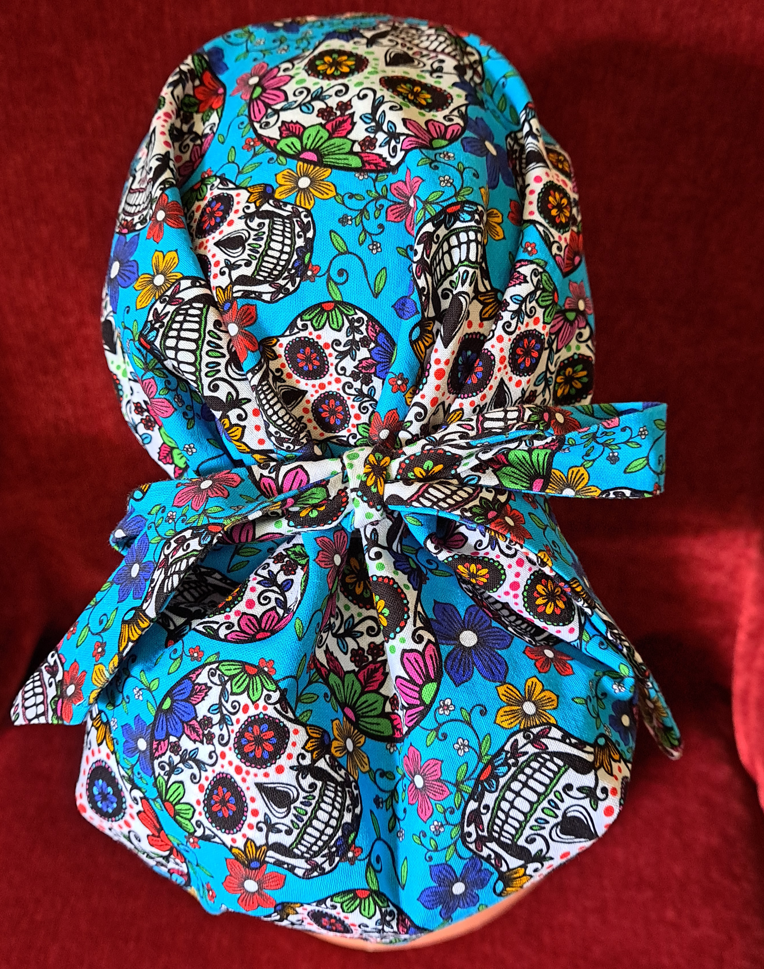 Handmade Sugar Skulls Reversible Pony Tail Scrub Cap - Turquoise Sugar Skull Fabric Reverses to Black Sugar Skull Fabric