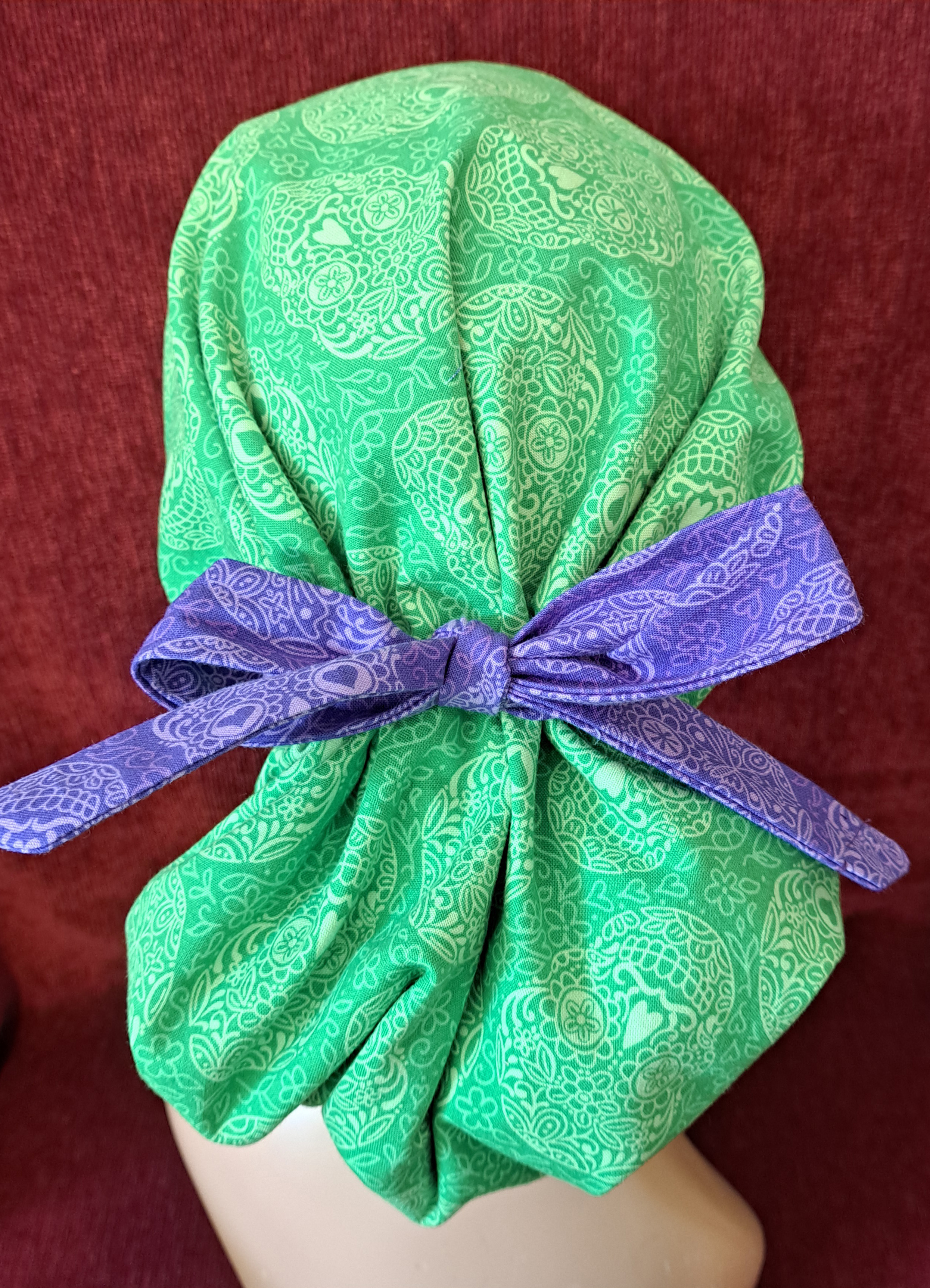 Handmade Reversible Pony Tail Scrub Cap - Turquoise Sugar Skull Fabric Reverses to Green Sugar Skull Fabric