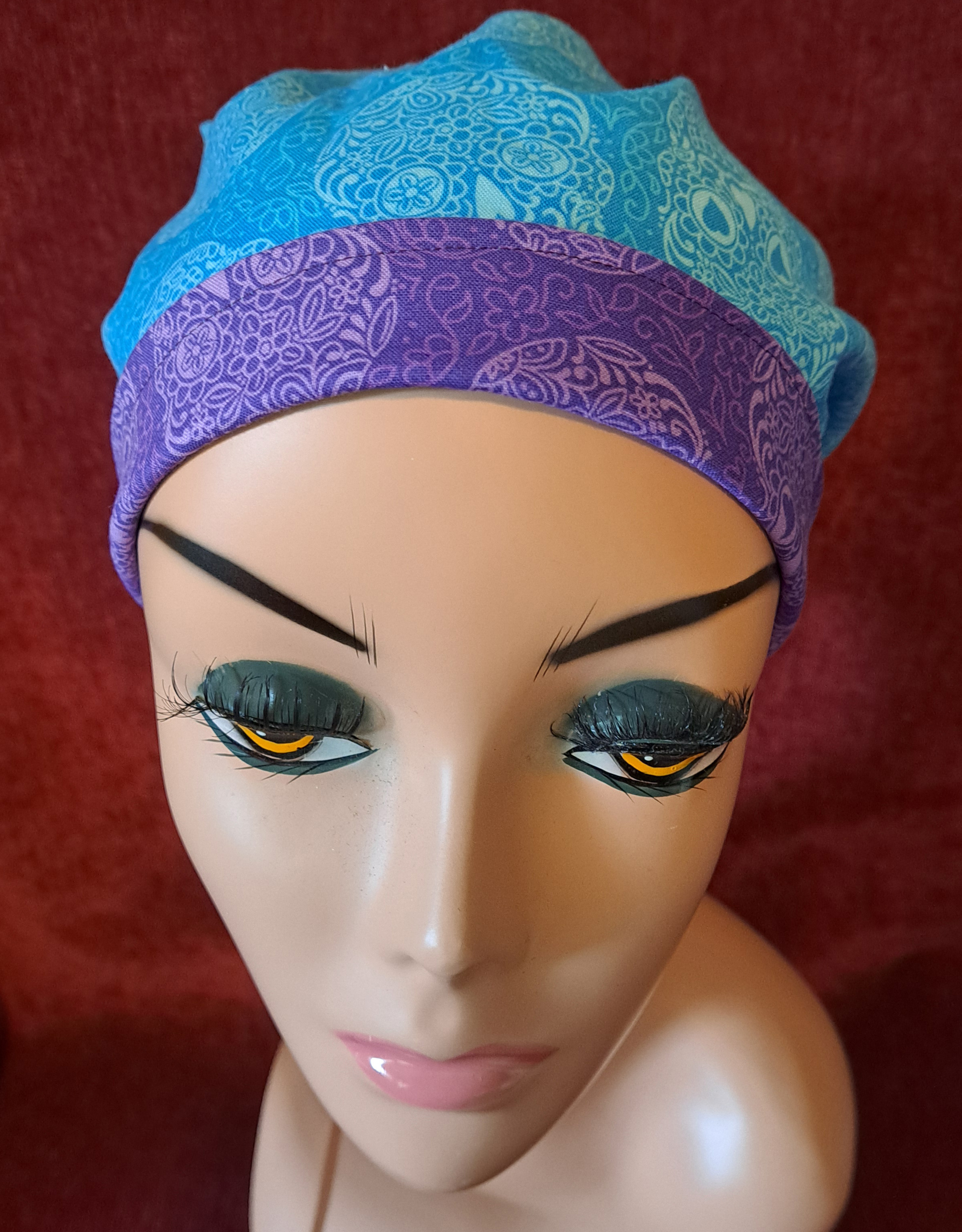 Handmade Reversible Pony Tail Scrub Cap - Turquoise Sugar Skull Fabric Reverses to Purple Sugar Skull Fabric