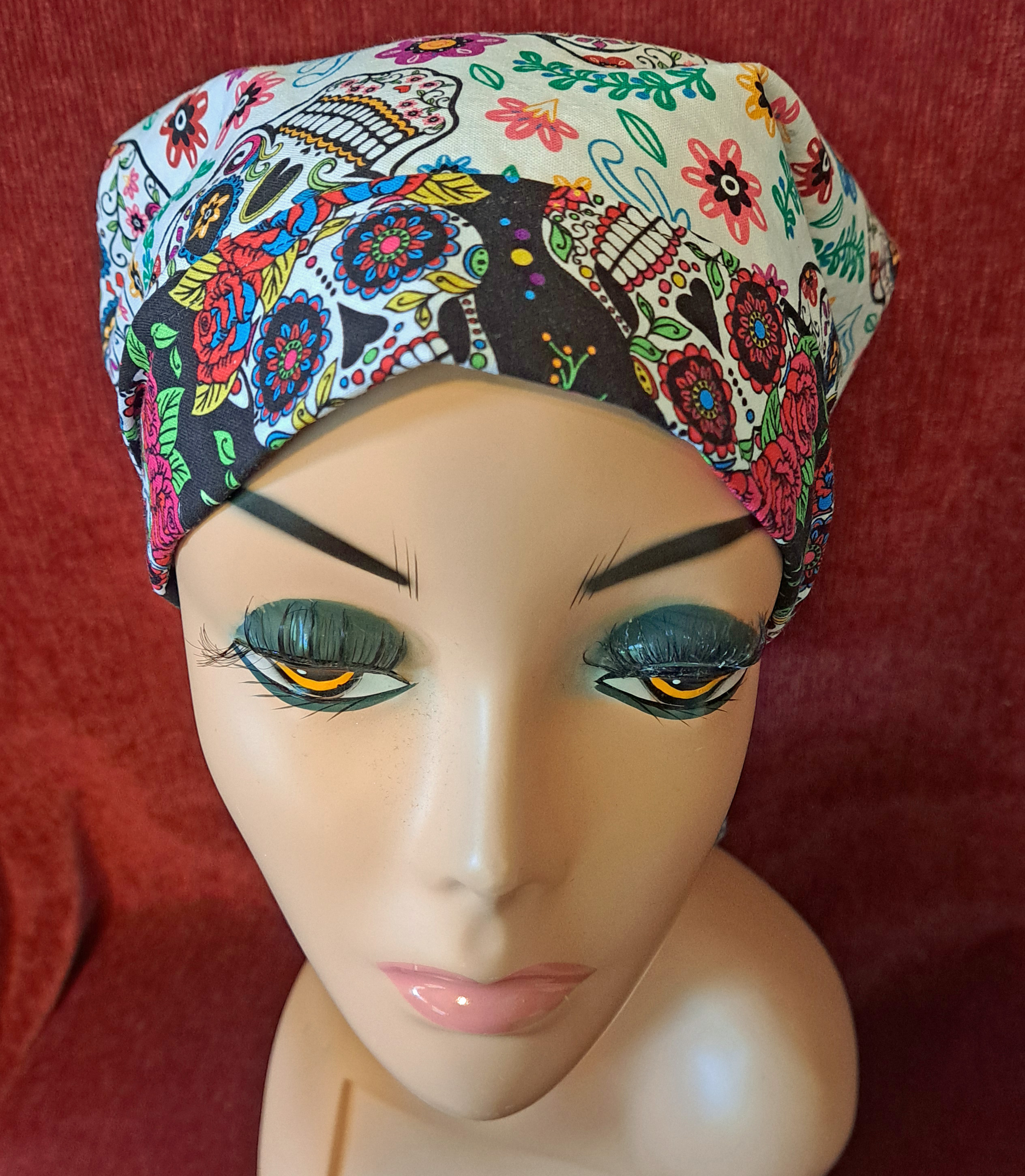 Handmade Reversible Pony Tail Scrub Cap - White Sugar Skull Fabric Reverses to Black Sugar Skull Fabric
