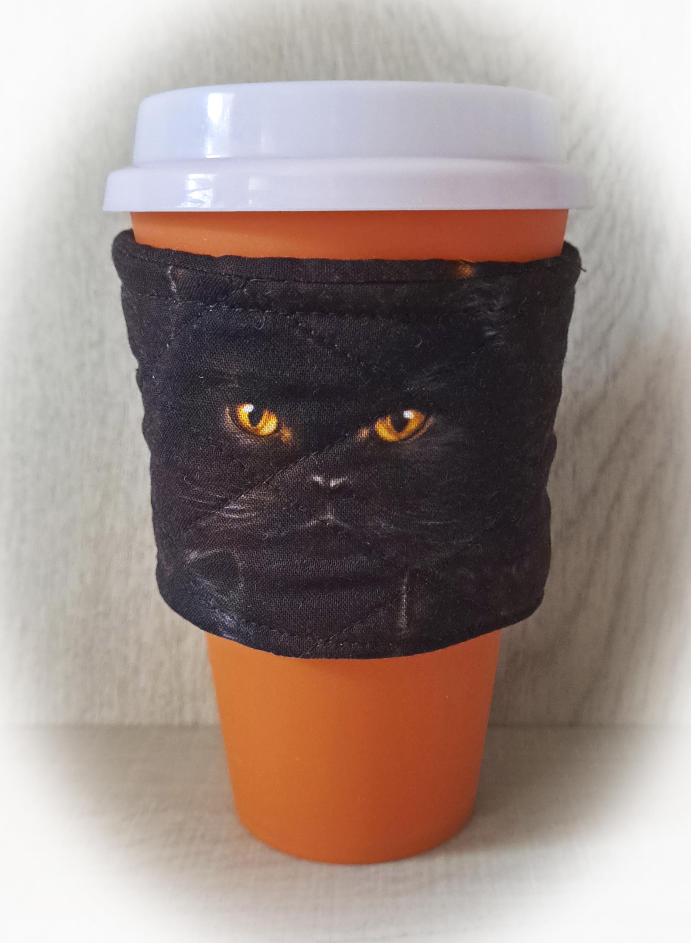 Handmade Reusable Coffee Sleeve/Mug Cozy in a Black Cat with Golden Eyes Fabric