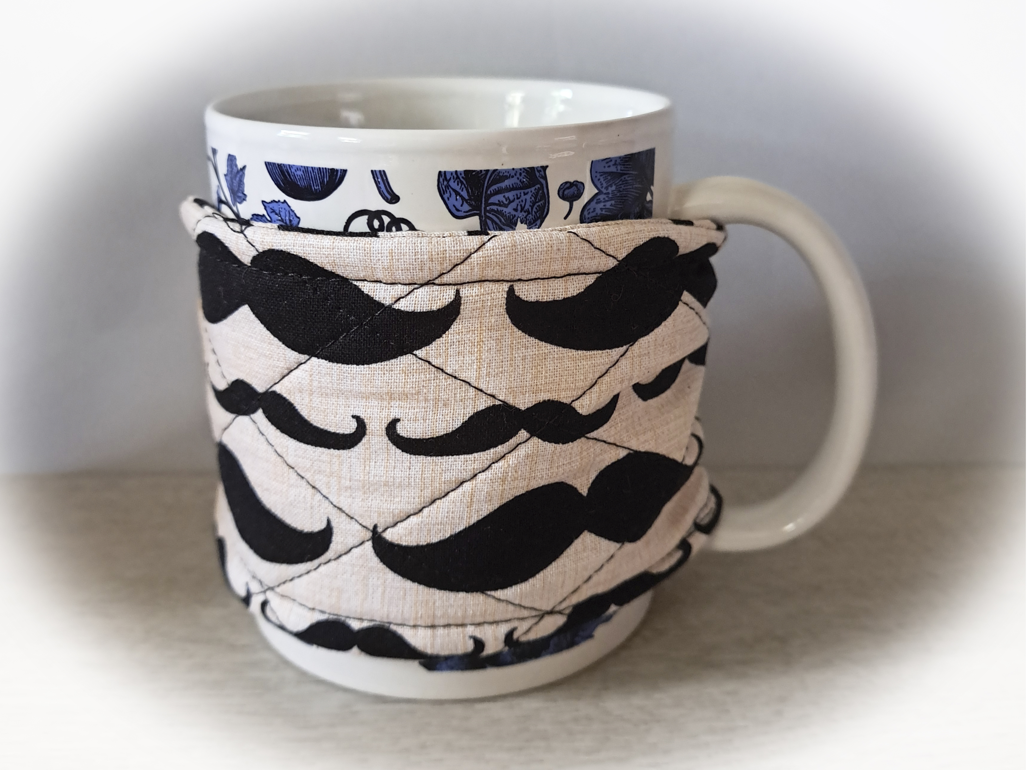 Handmade Reusable Cup Sleeve/Mug Cozy in a Moustache Fabric