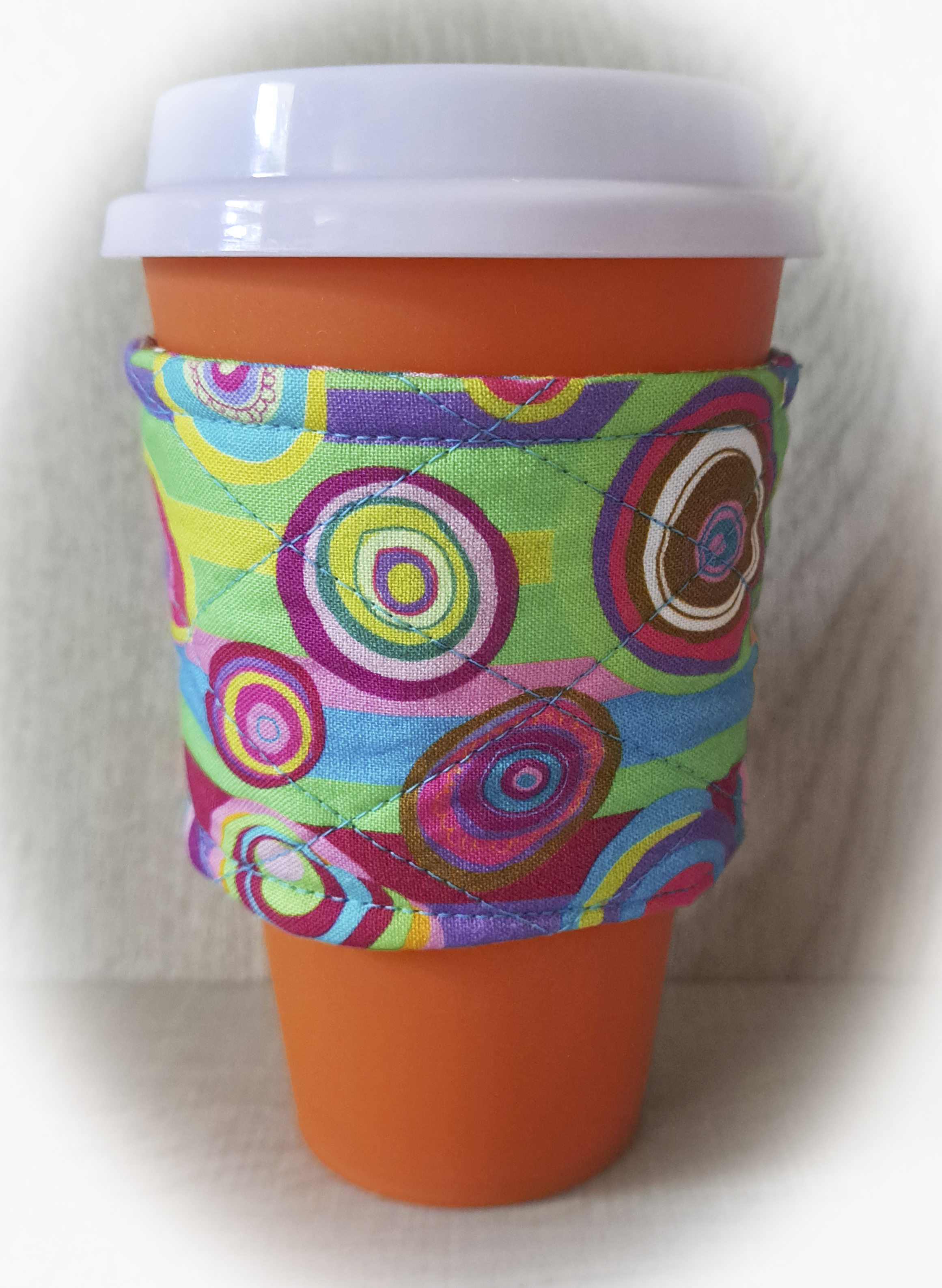 Handmade Reusable Cup Sleeve/Mug Cozy in a Bright Geometric Fabric