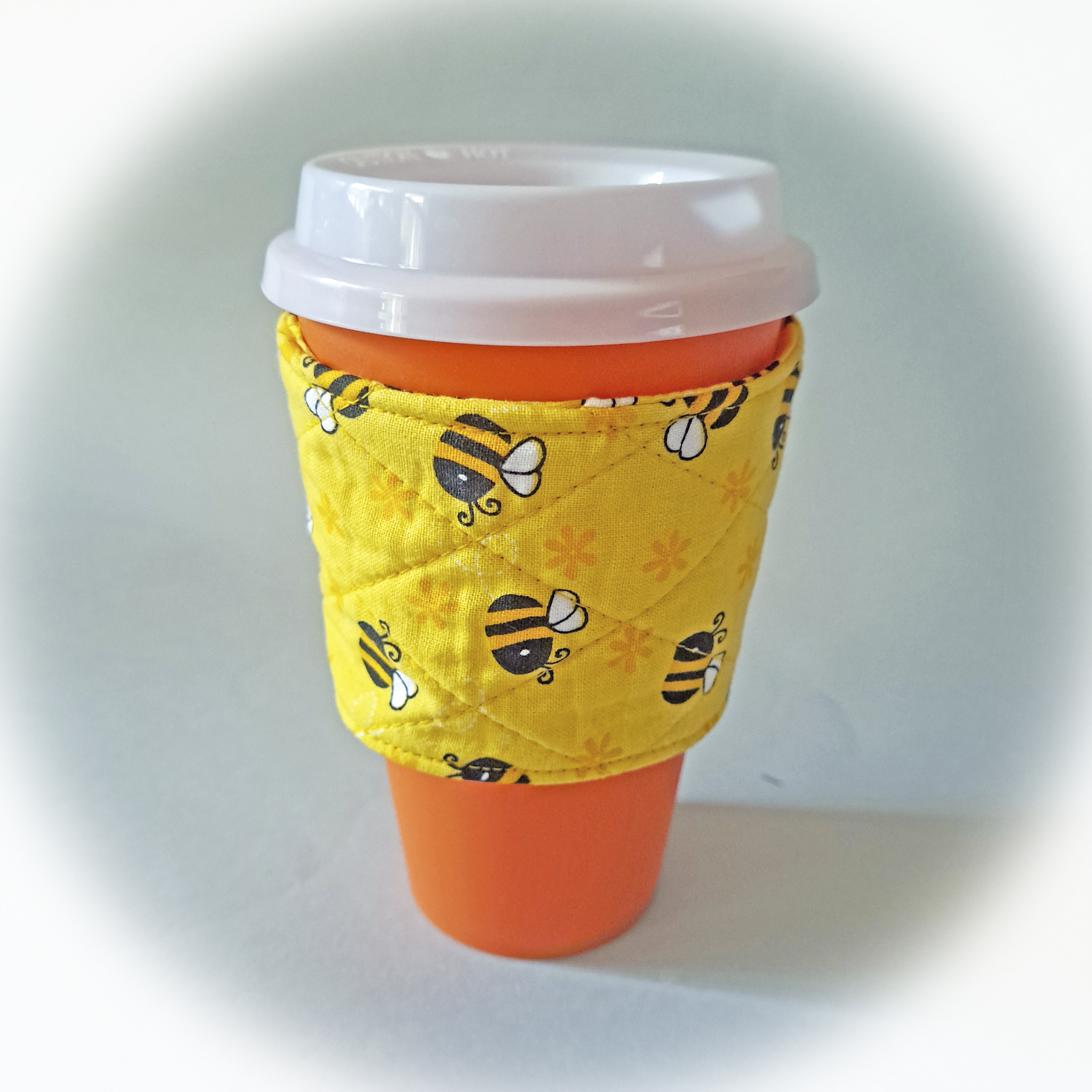 Handmade Reusable Cup Sleeve/Mug Cozy in a Yellow and Black Bee Fabric