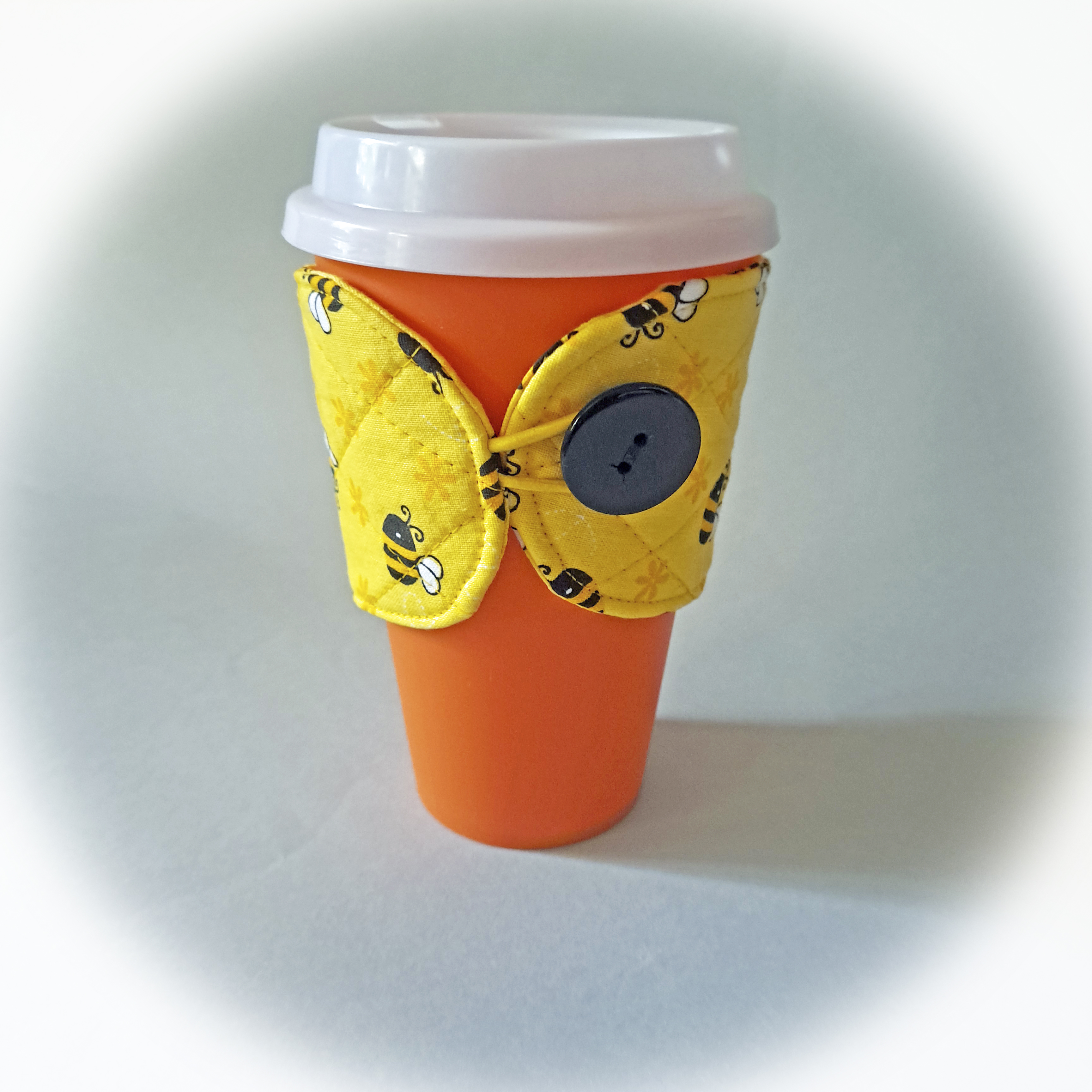 Handmade Reusable Cup Sleeve/Mug Cozy in a Yellow and Black Bee Fabric