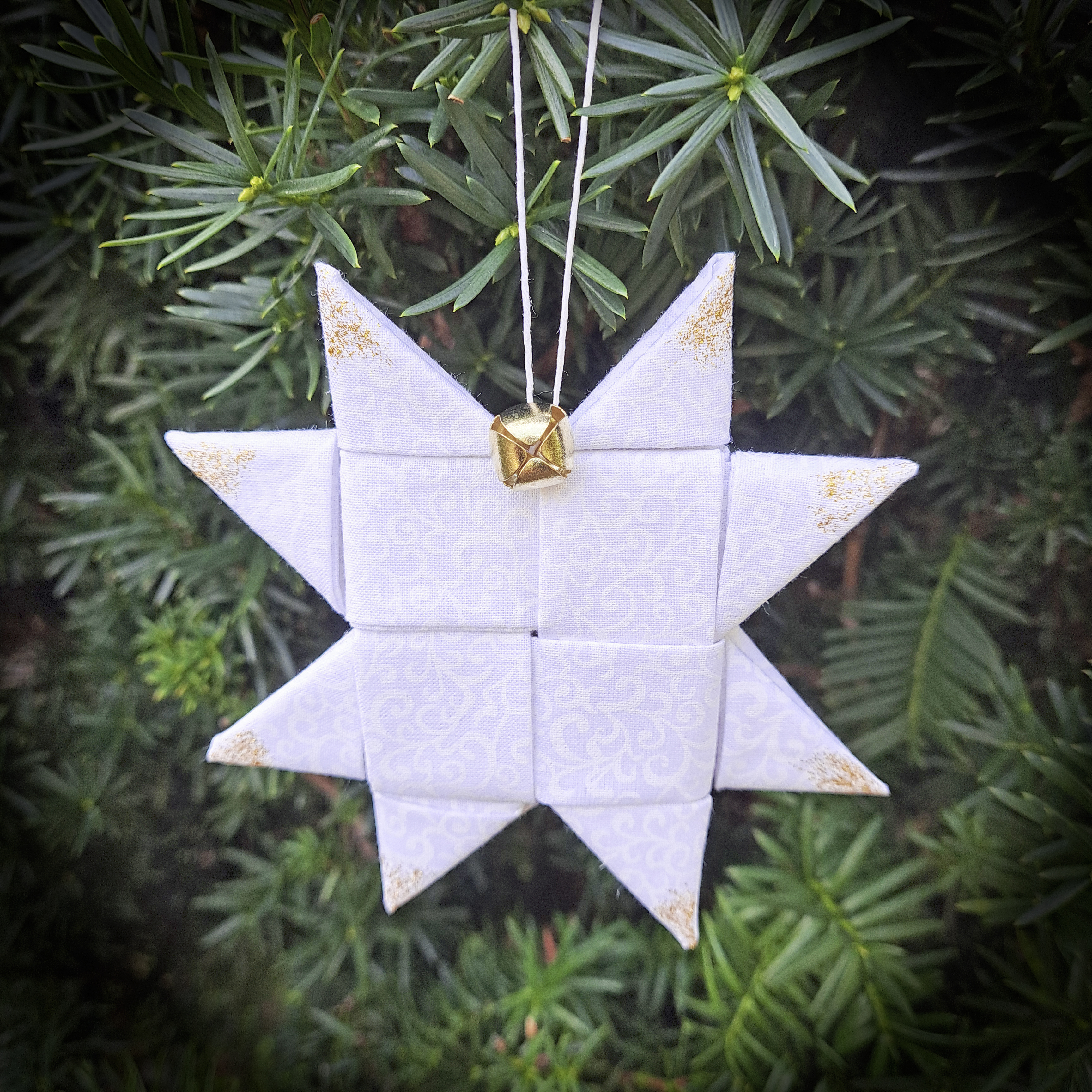 Handmade White Scandinavian Fabric Star Ornament with Gold Tips