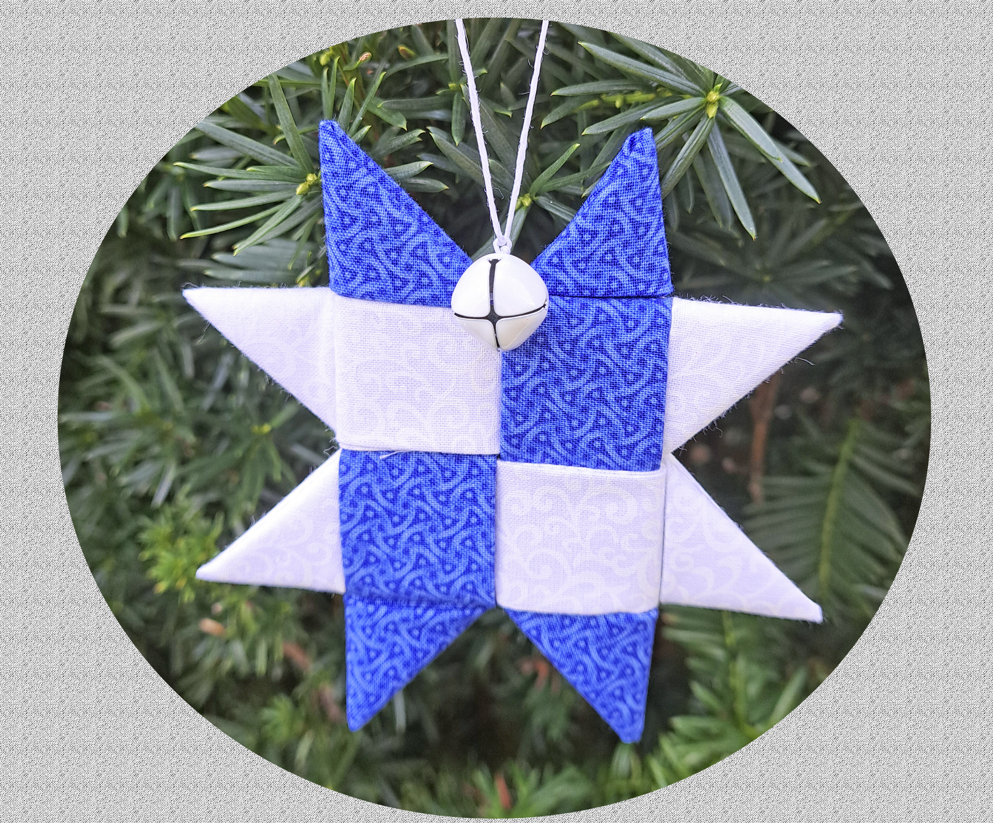 Handcrafted Scandinavian Blue and White Fabric Star Ornament Adorned with Blue or White Bell