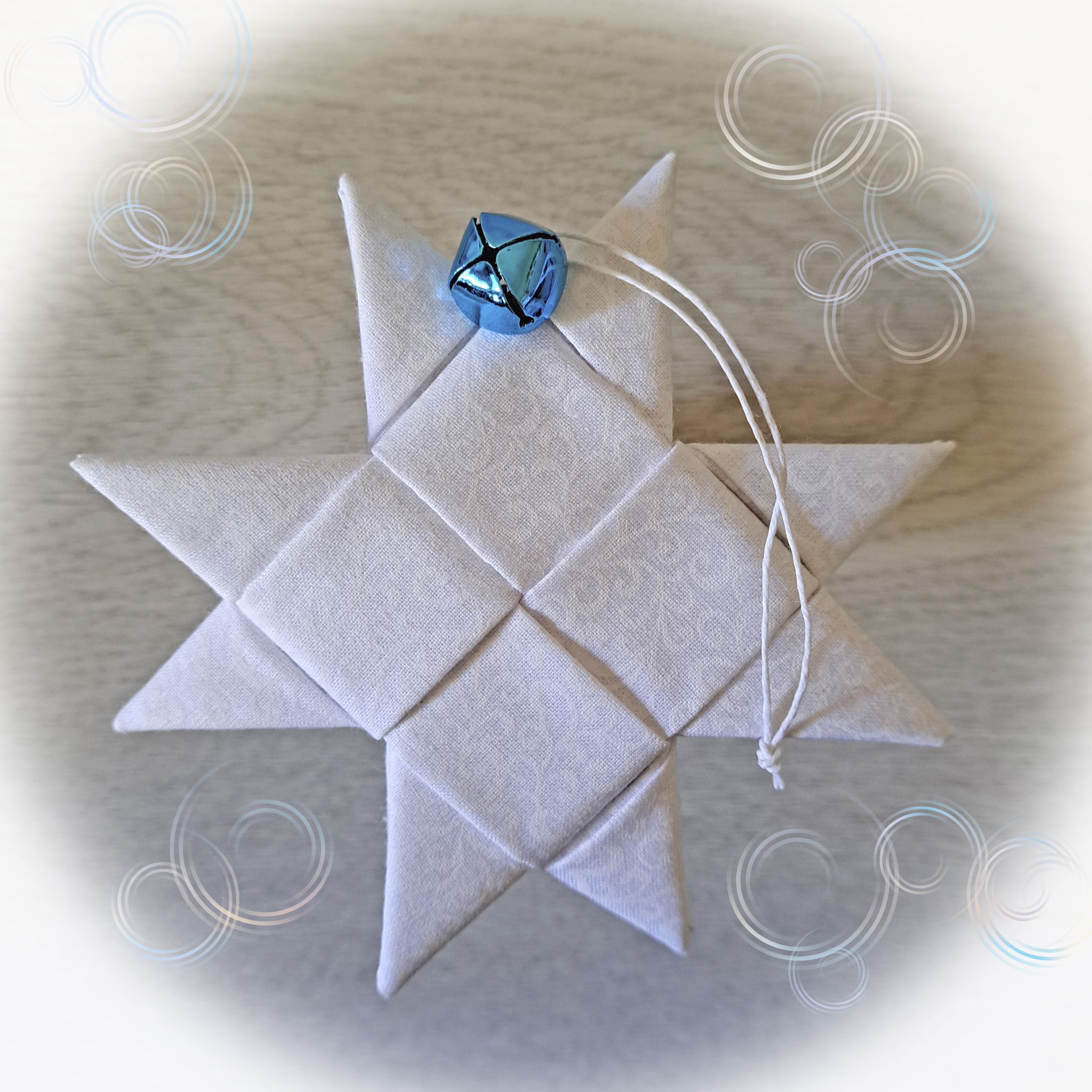 Handcrafted Scandinavian Blue and White Fabric Star Ornament Adorned with Blue or White Bell