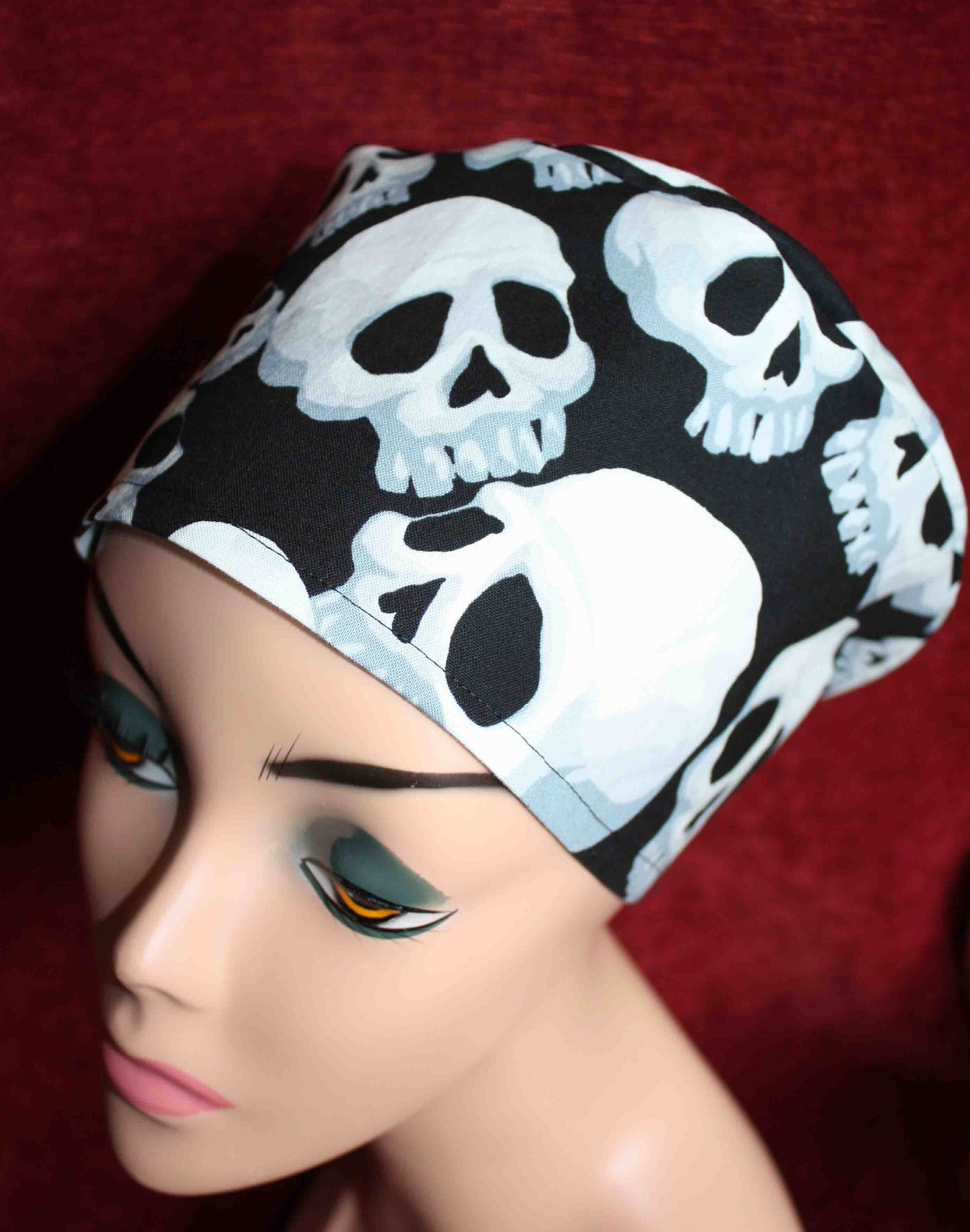Handmade Black Fabric with White Varying Sized Skulls Surgical/Scrub Cap