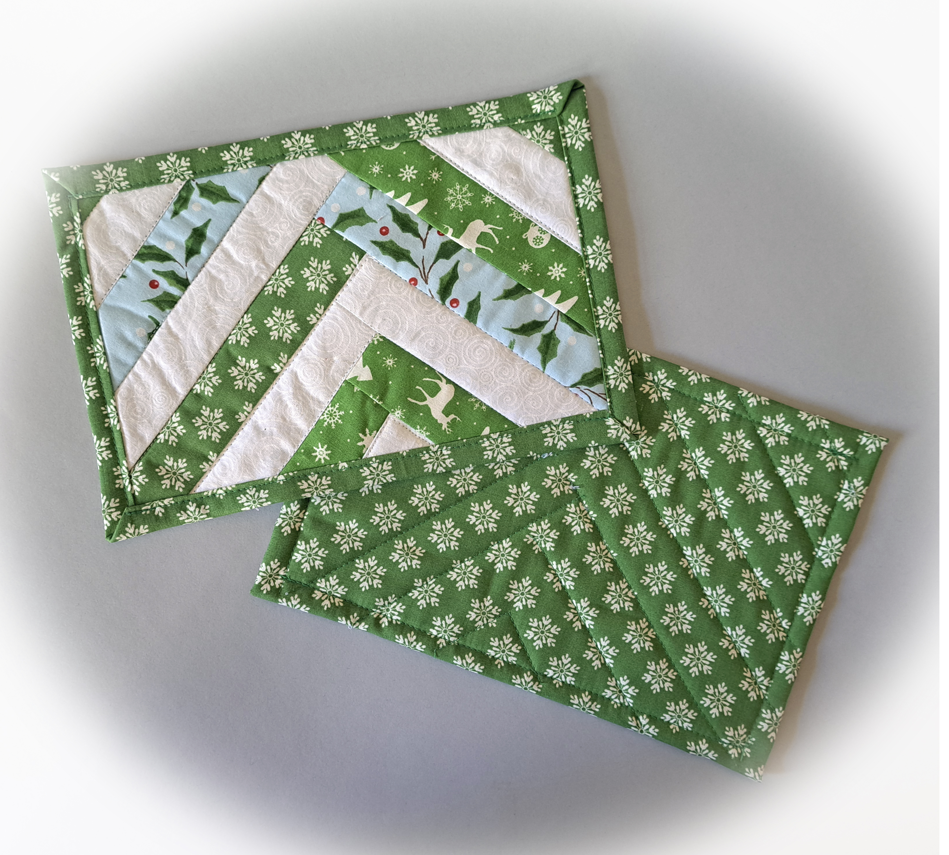 Handmade Fabric Quilted Holiday Mug Rugs - Green and White with Blue Holly Braid Design - Set of 2