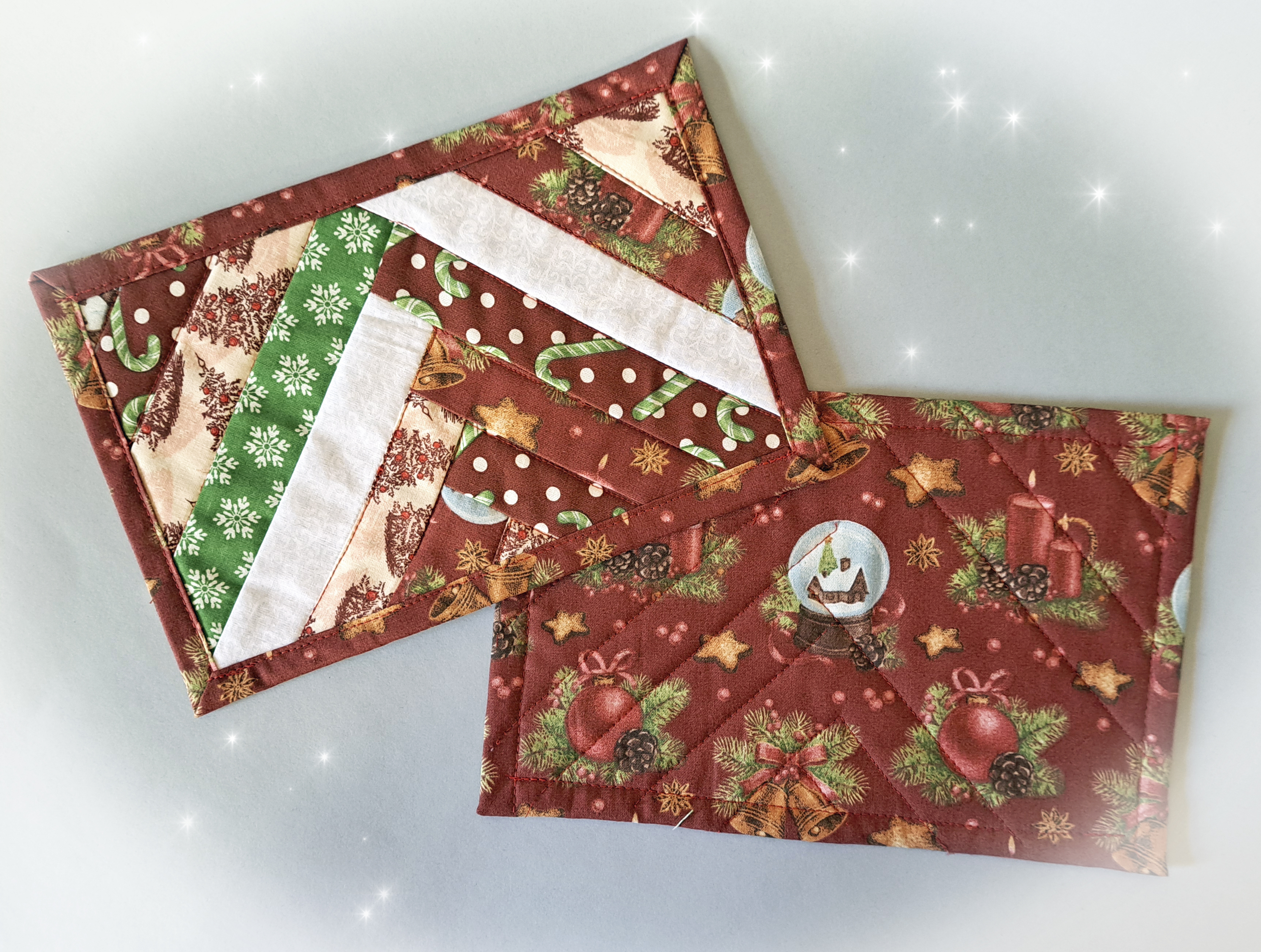 Handmade Fabric Quilted Holiday Mug Rugs - Red and White with Green Snowflake Pattern Fabric - Braid Design - Set of 2