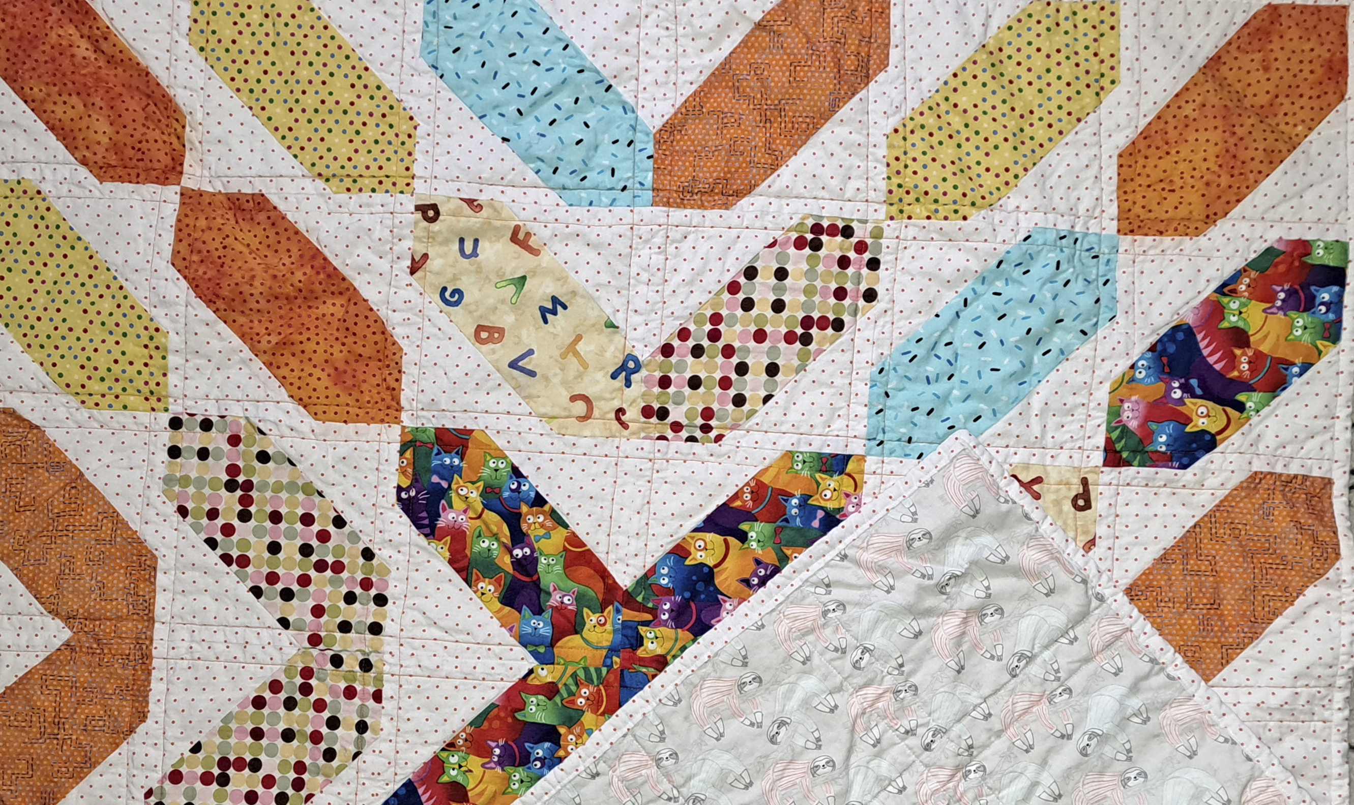 Handmade Colorful Infant Quilt - Sloths in Pajamas Backing Fabric