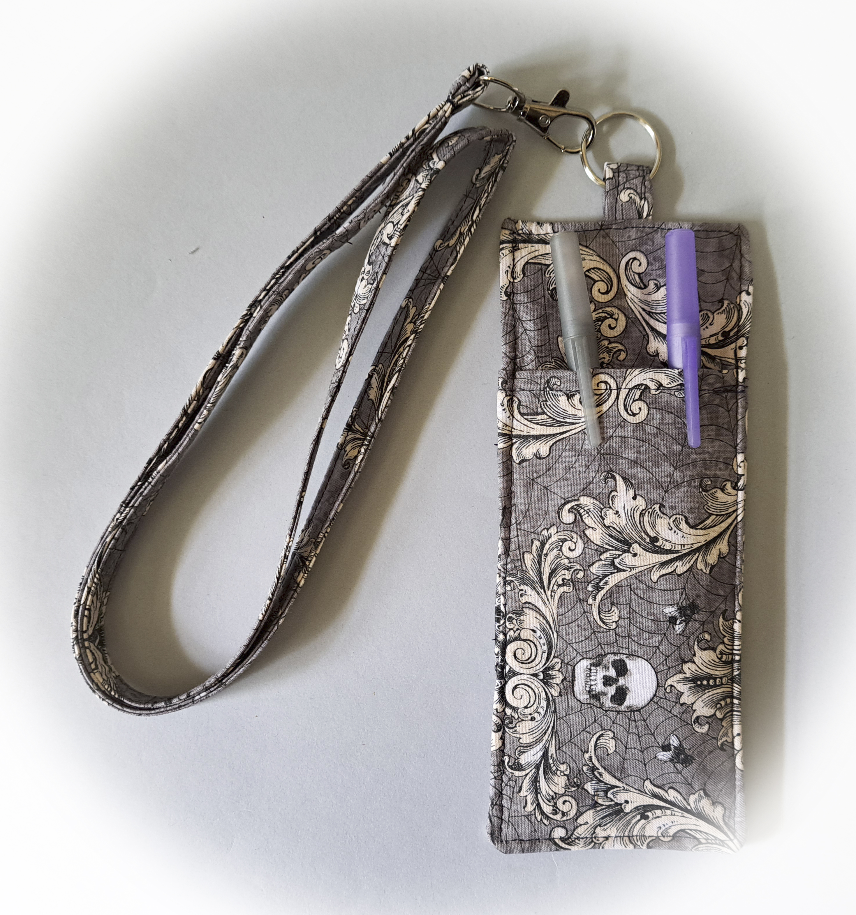 Skulls and Swirls Eyeglass and Pen Holder with Matching Lanyard