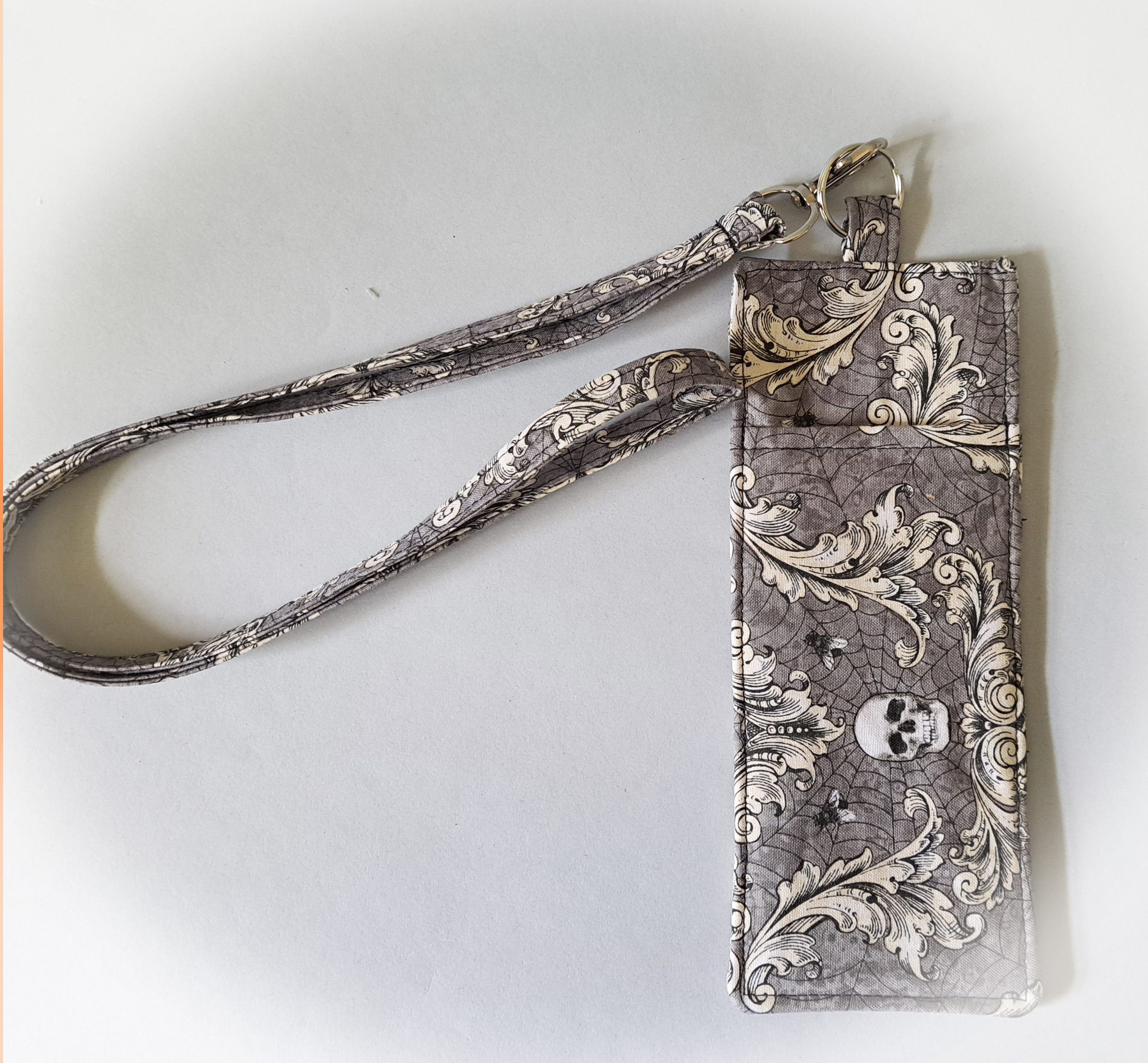 Skulls and Swirls Eyeglass and Pen Holder with Matching Lanyard