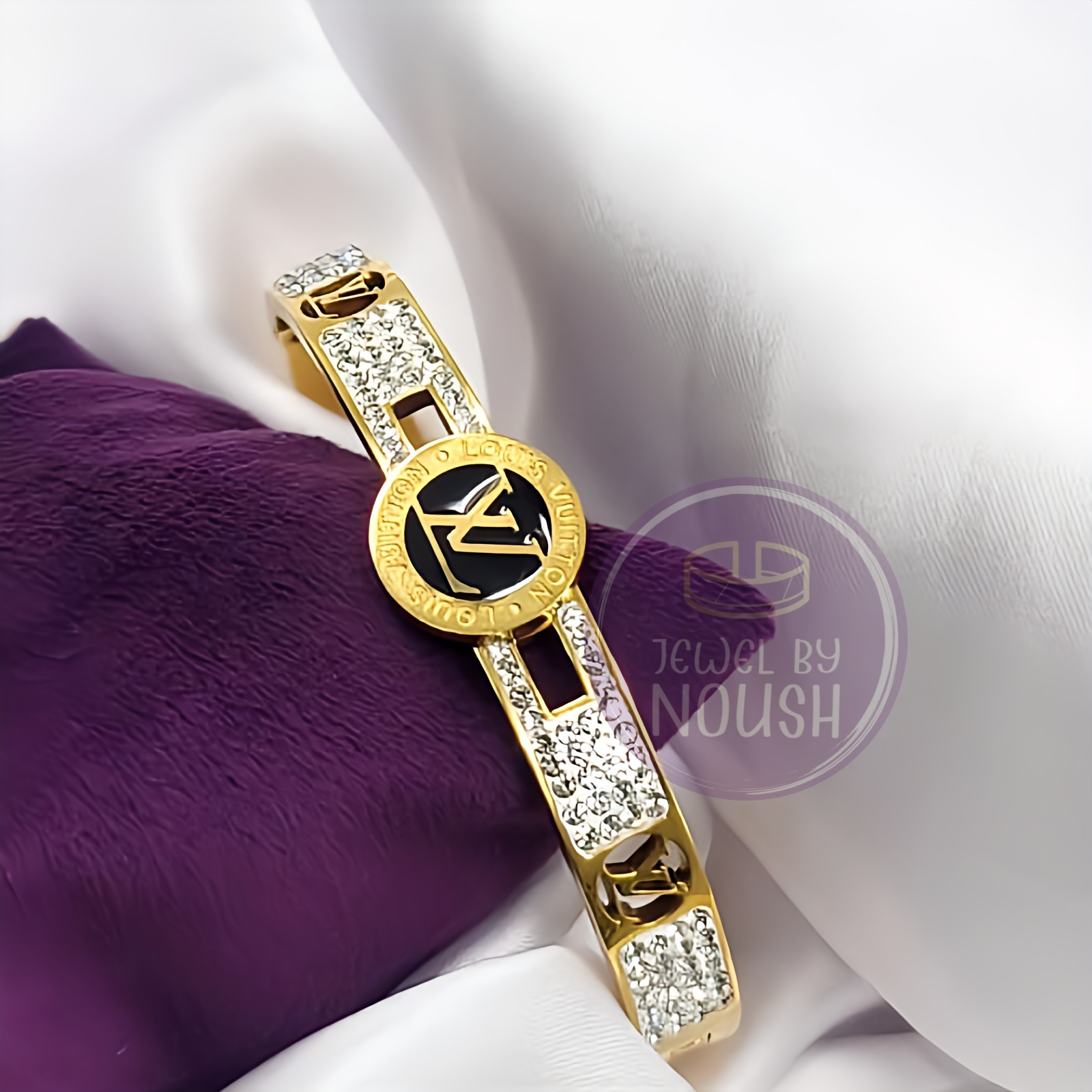 Emblematic Gold-Toned Bracelet Inspired by LV