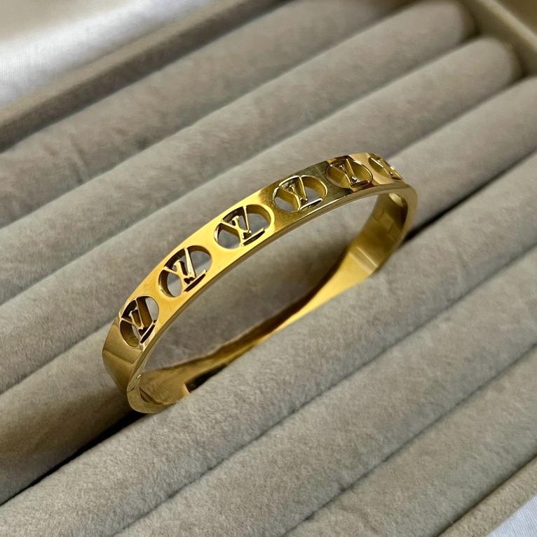 Elegant Gold Cut-Out Bracelet Inspired by LV