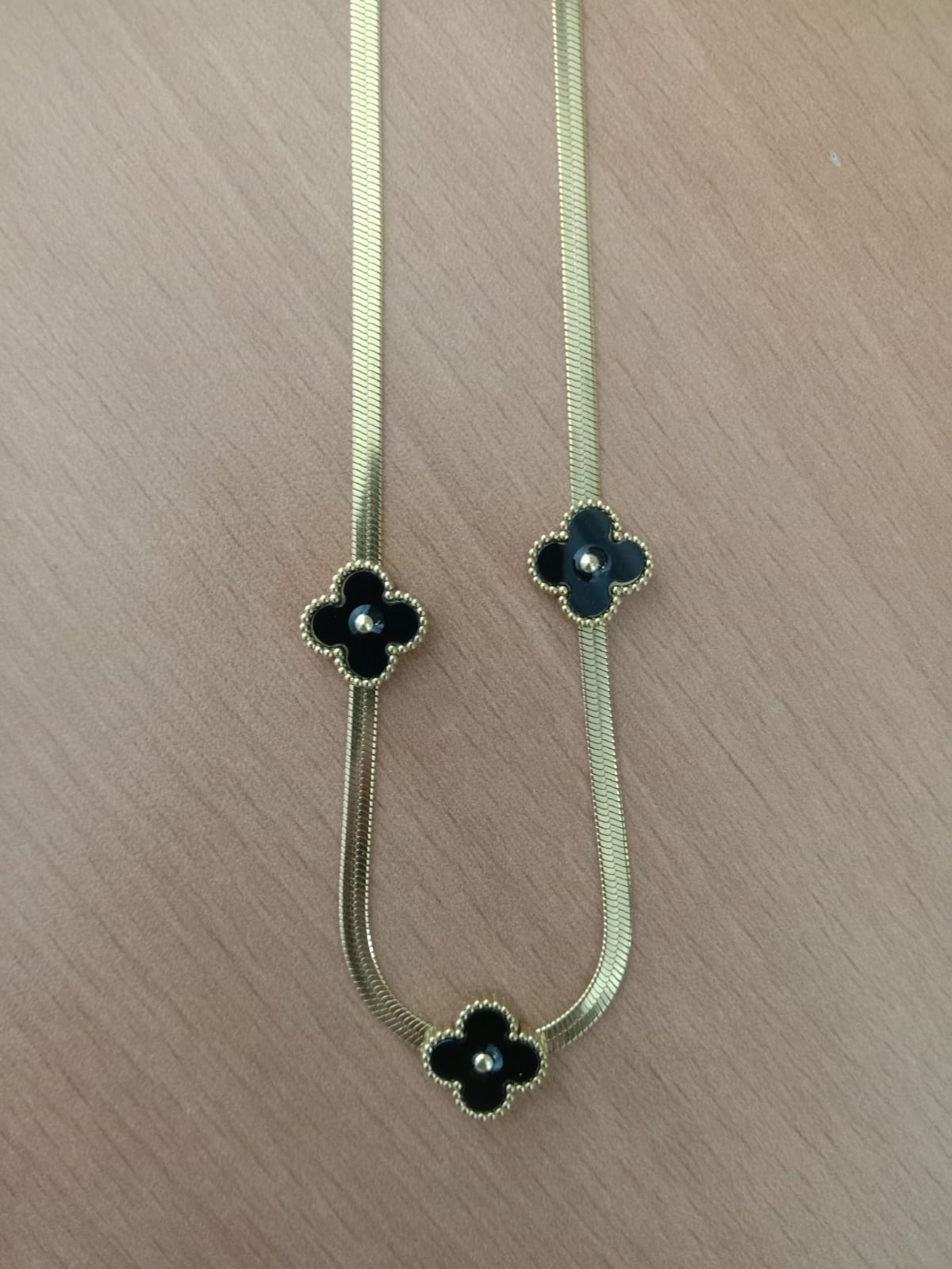 Elegant Gold-Tone Snake Chain Necklace with Black Flower Pendants