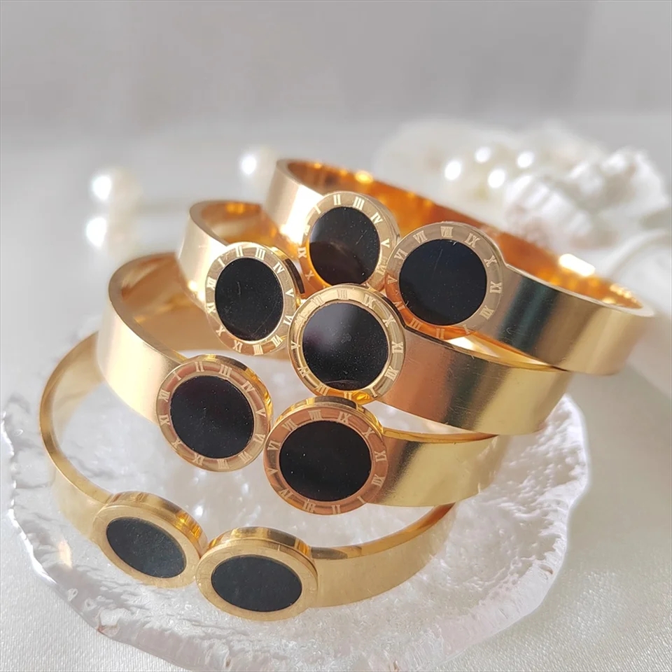 Elegant Gold Bracelet with Black Inlays
