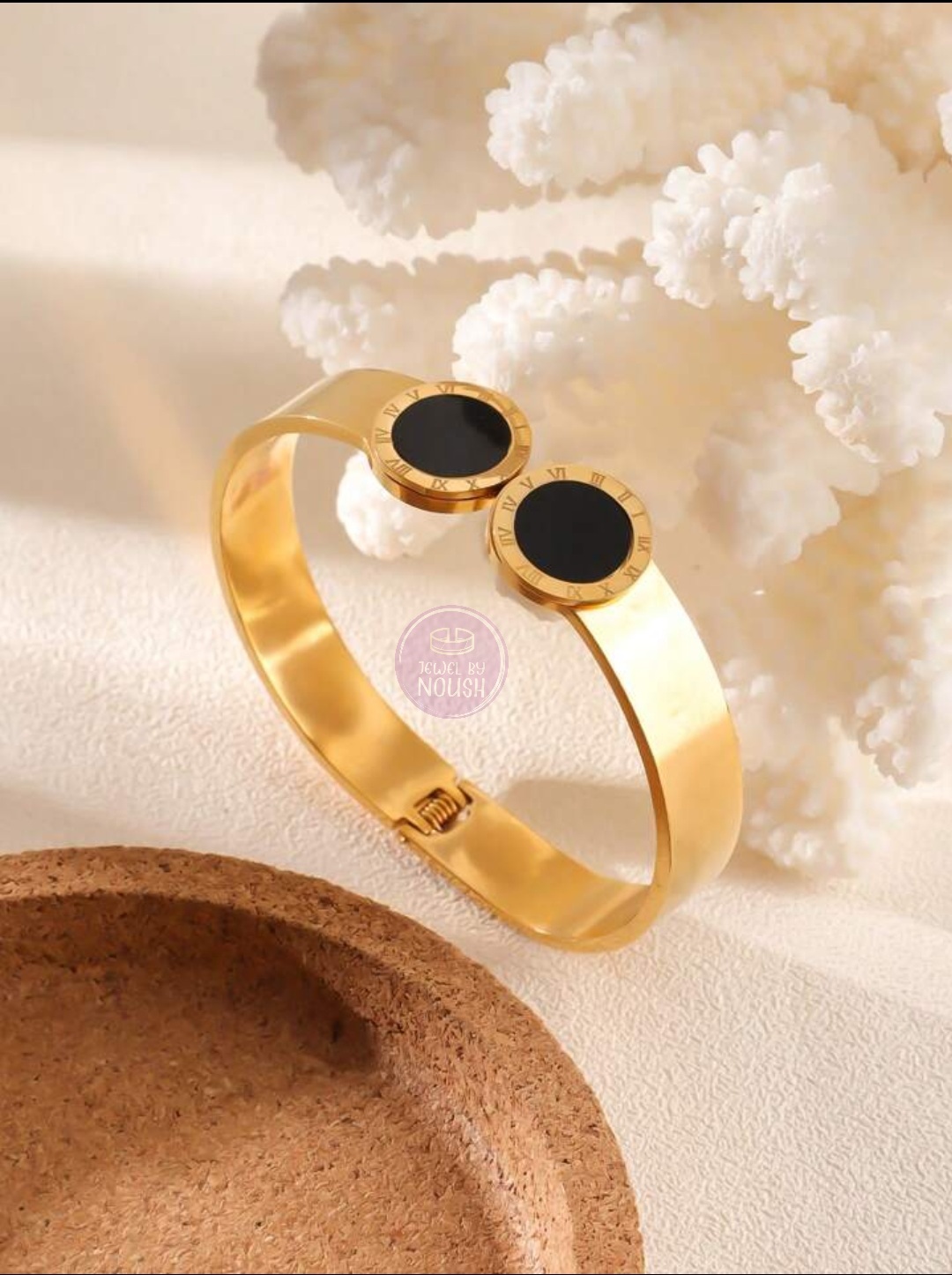 Elegant Gold Bracelet with Black Inlays