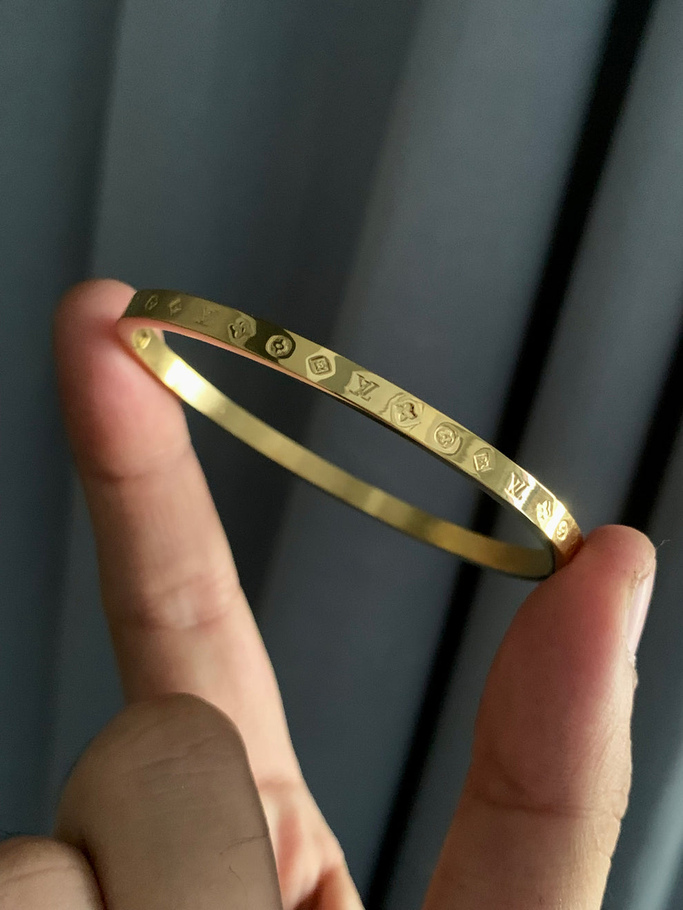 Ancient Script Embossed Gold Bracelet Inspired by LV