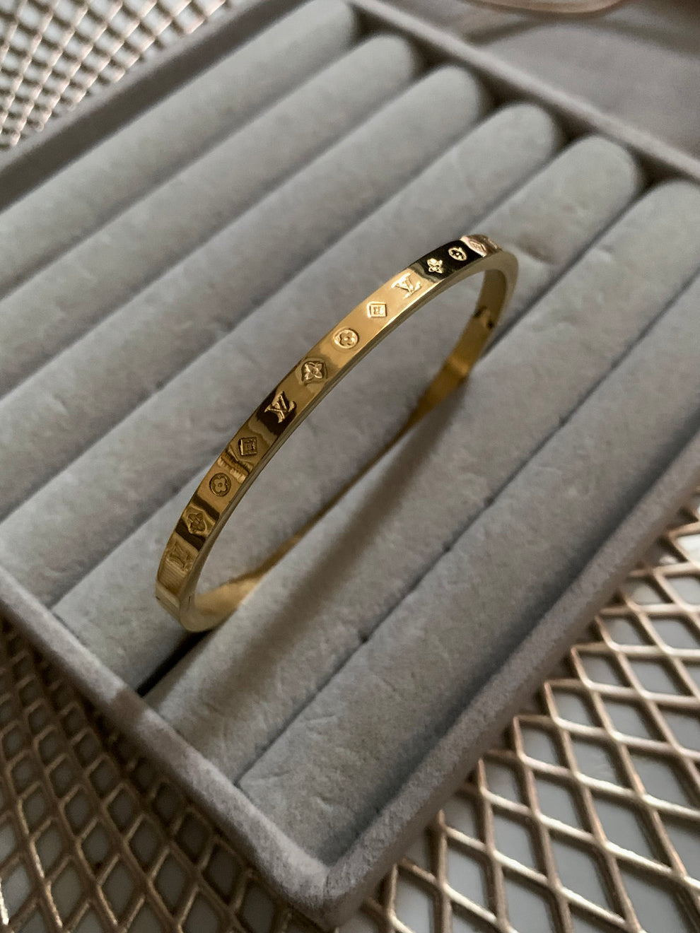 Ancient Script Embossed Gold Bracelet Inspired by LV