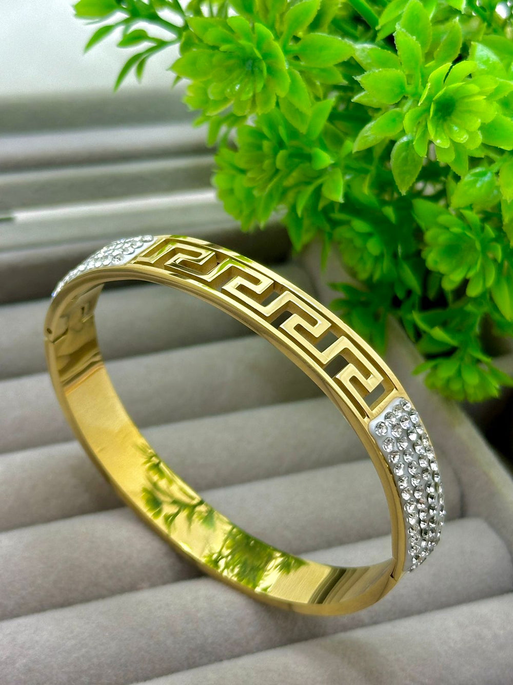 Gold Bangle with Greek Key Design and Diamond Accents