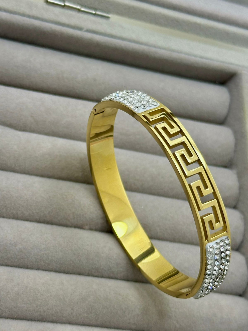 Gold Bangle with Greek Key Design and Diamond Accents