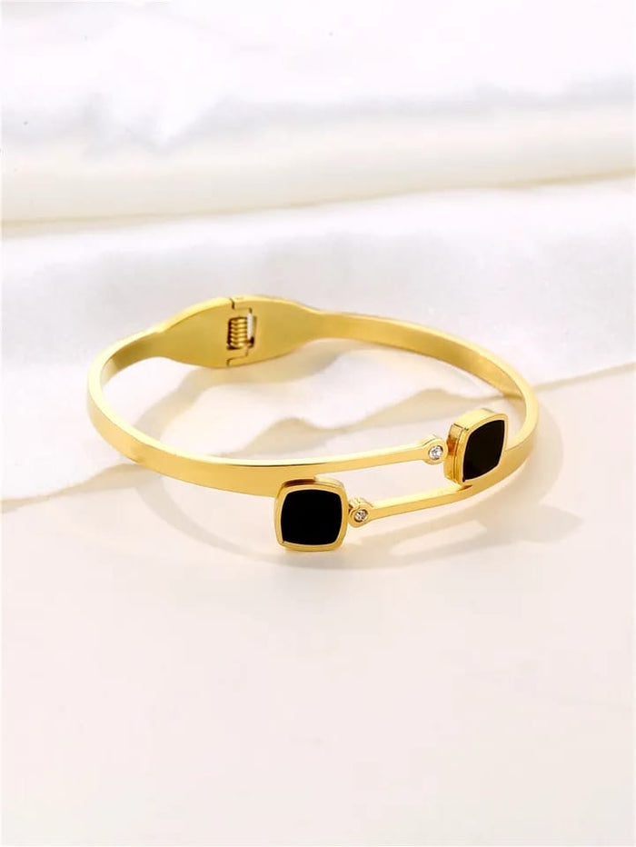 Elegant Gold-Tone Bracelet with Black Gemstones