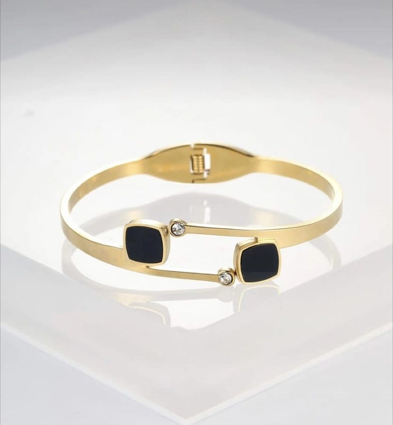 Elegant Gold-Tone Bracelet with Black Gemstones