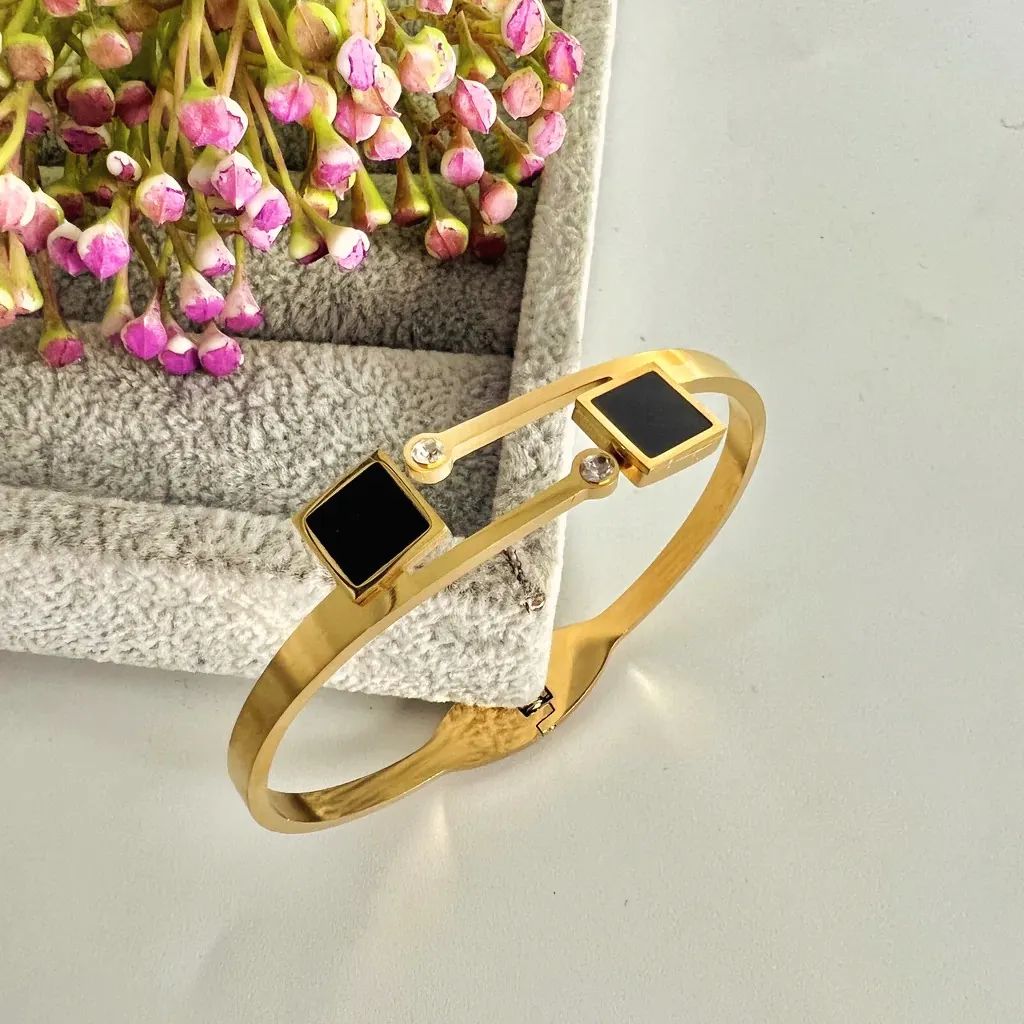 Elegant Gold-Tone Bracelet with Black Gemstones