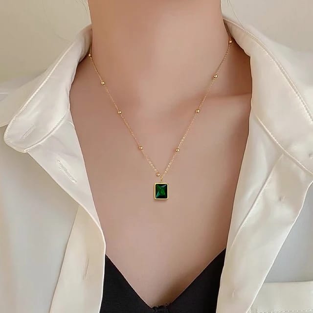 Elegant Gold Chain Necklace with Green Gemstone Pendant