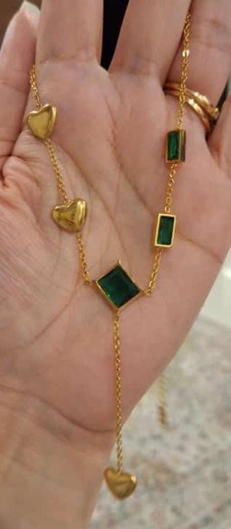 Gold Necklace with Green Gemstones and Heart Accents