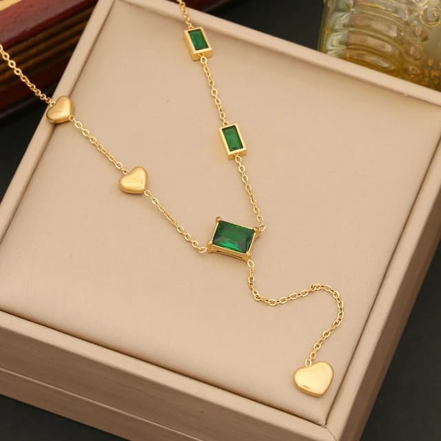 Gold Necklace with Green Gemstones and Heart Accents