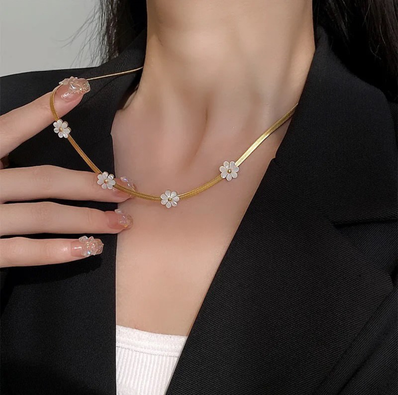 Gold Necklace with White Floral Accents