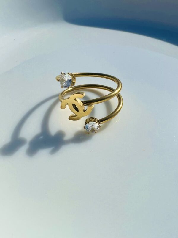  Elegant Gold Chanel Logo Ring with Gemstones