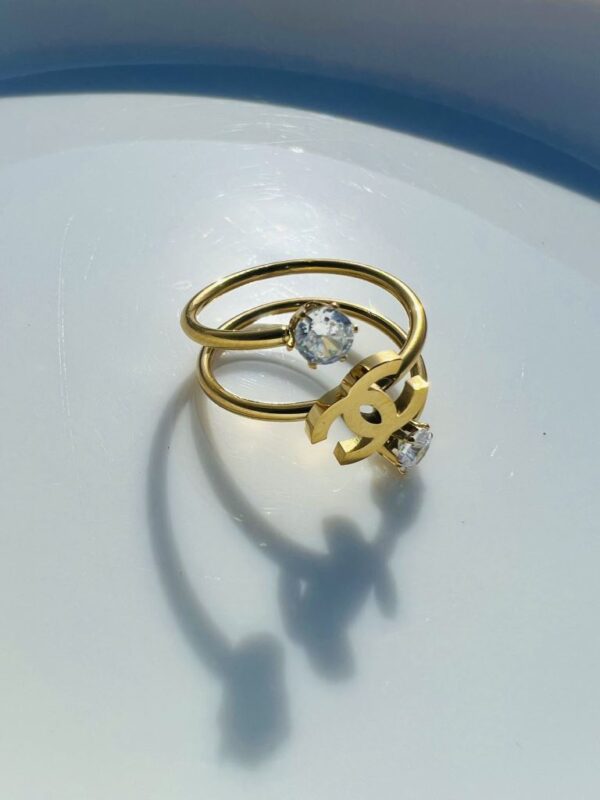  Elegant Gold Chanel Logo Ring with Gemstones