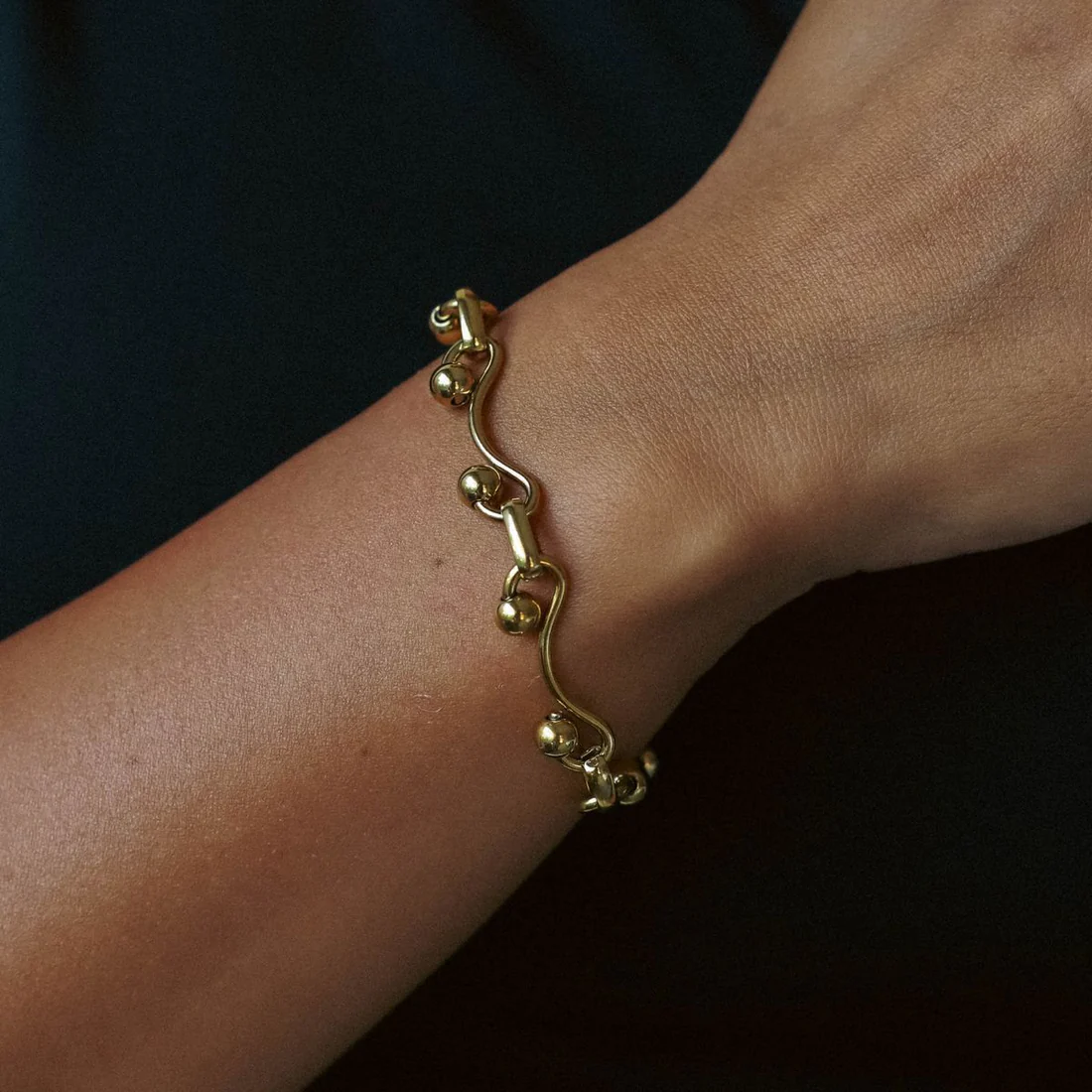 Elegant Golden Sphere Charm Bracelet