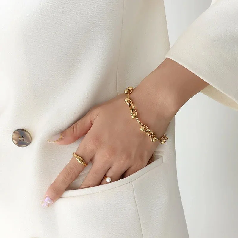Elegant Golden Sphere Charm Bracelet