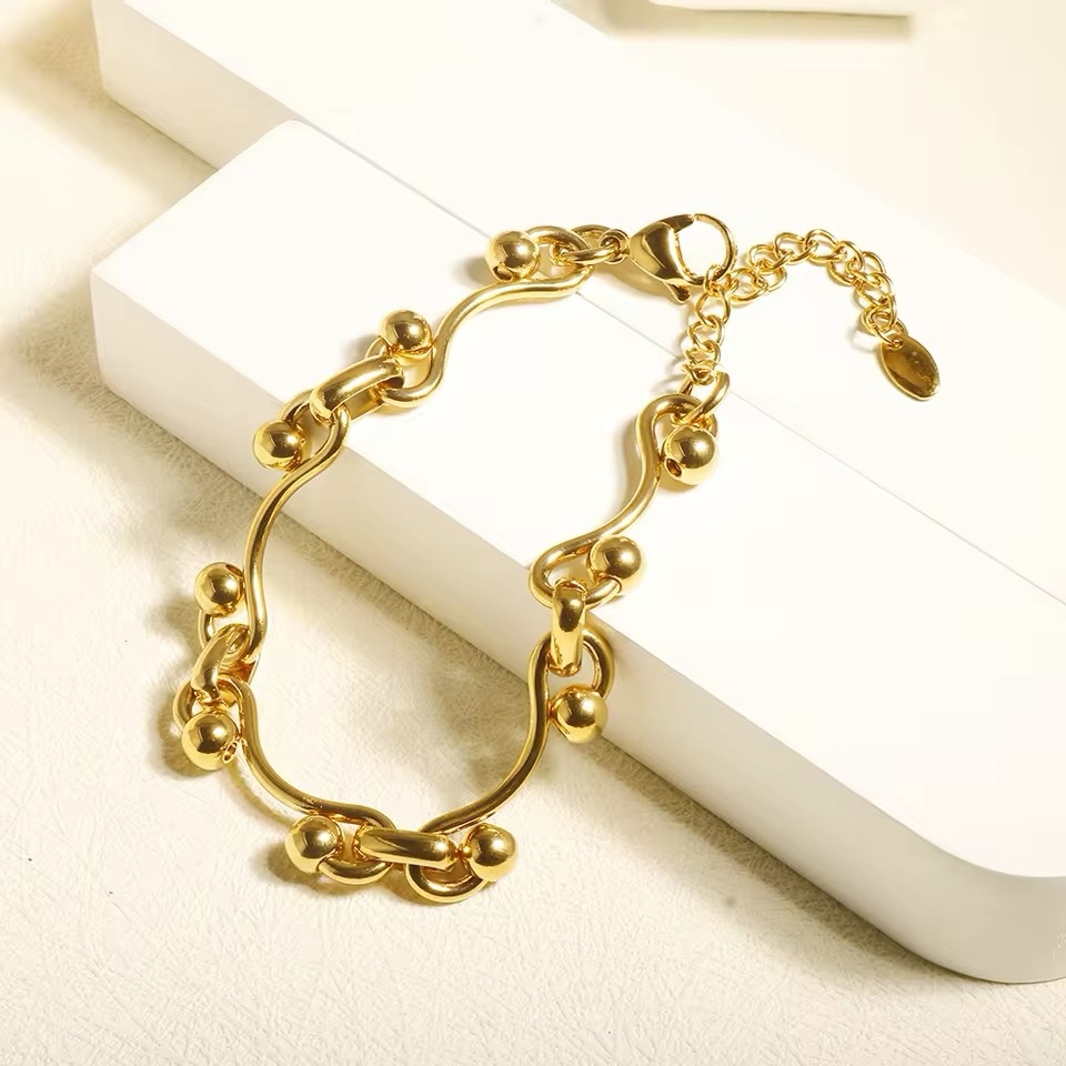 Elegant Golden Sphere Charm Bracelet
