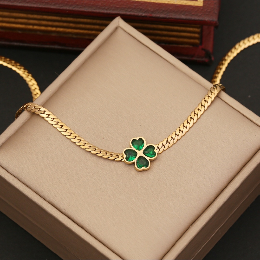 Lucky Charm Gold-Tone Twisted Rope Bracelet with Faux Emerald