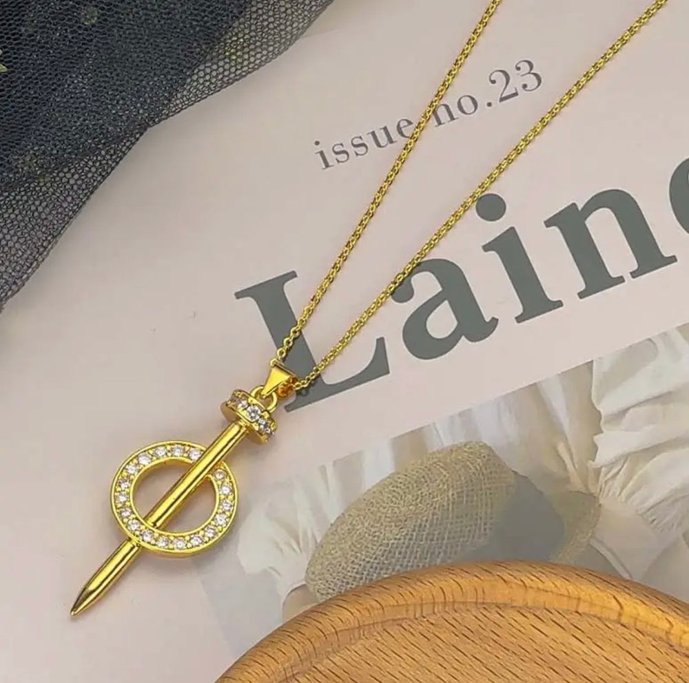 Elegant Gold-Tone Nail Shape Pendant Necklace